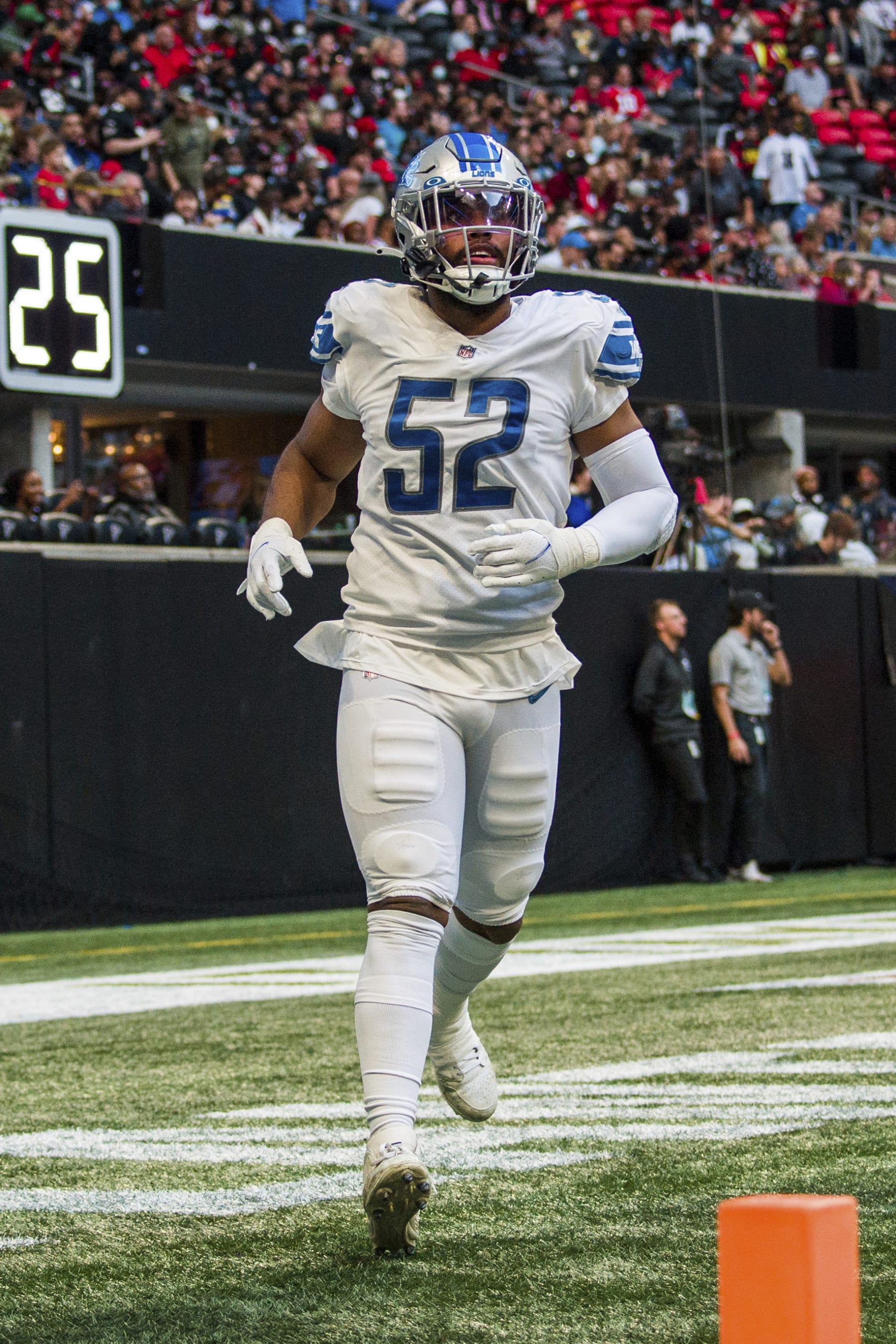 Detroit Lions linebacker Jessie Lemonier (52) returns to the sideline during the second half of an NFL football game against the Atlanta Falcons, Sunday, Dec. 26, 2021, in Atlanta. The Atlanta Falcons won 20-16. (AP Photo/Danny Karnik)