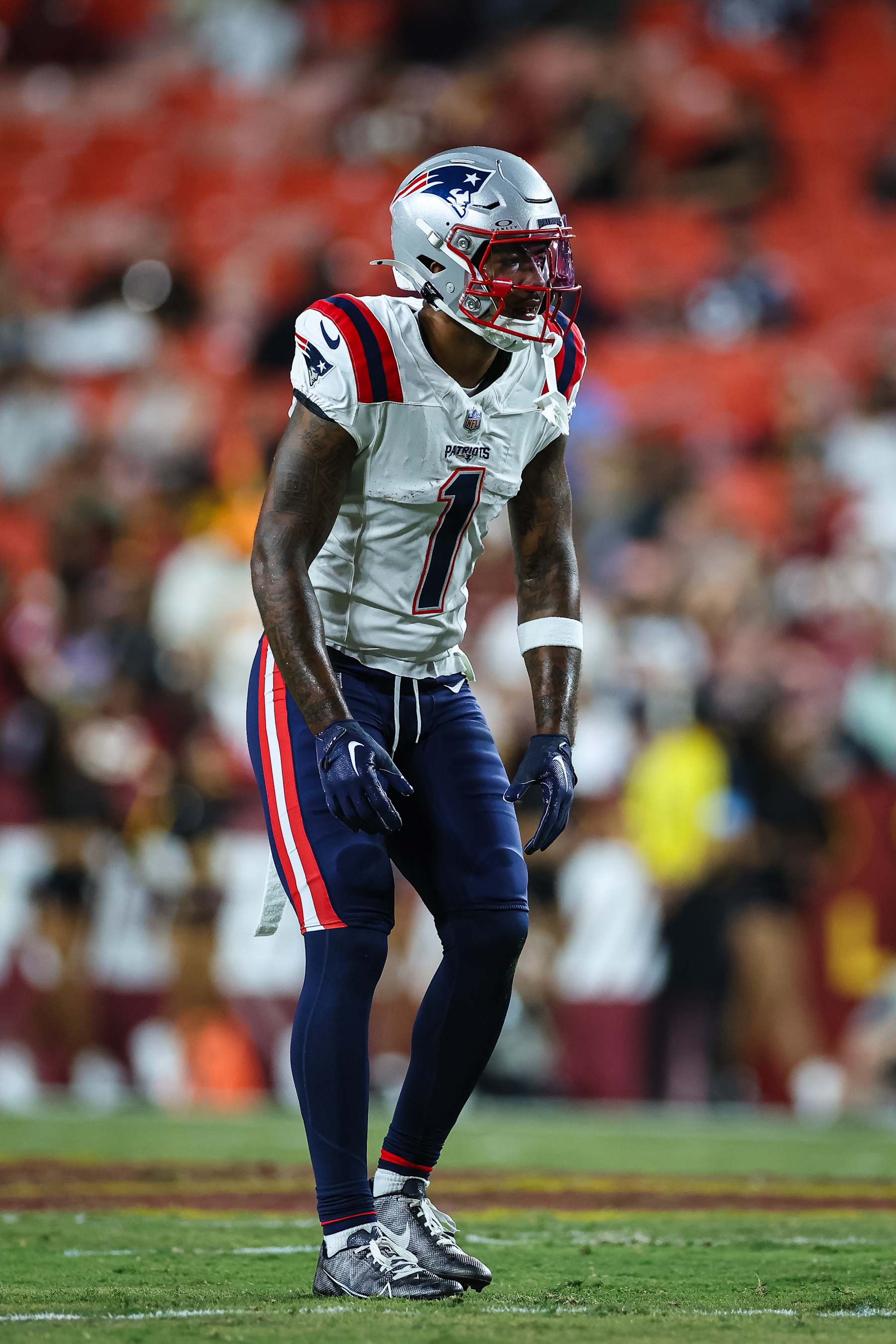 LANDOVER, MD - AUGUST 25: JaLynn Polk #1 of the New England Patriots lines up against the Washington Commanders during the first half of the preseason game at Commanders Field on August 25, 2024 in Landover, Maryland. (Photo by Scott Taetsch/Getty Images)