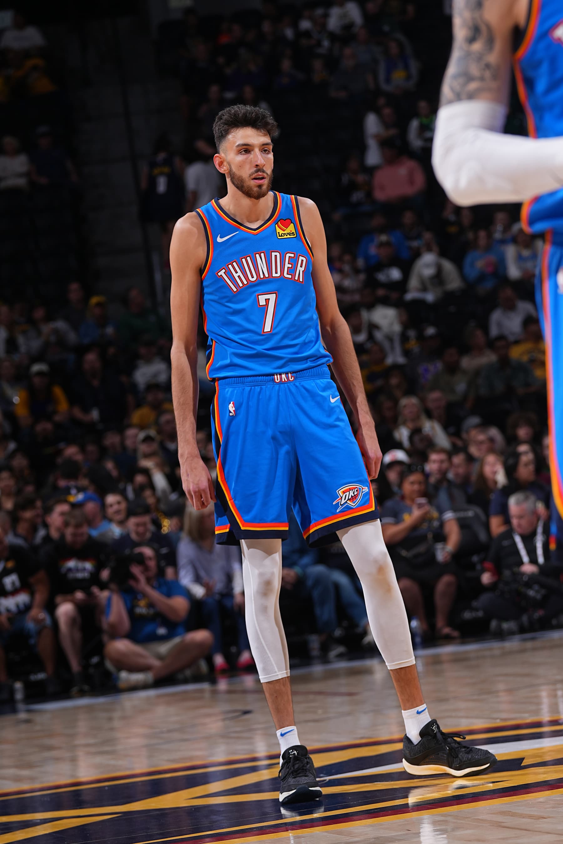 DENVER, CO - OCTOBER 15: Chet Holmgren #7 of the Oklahoma City Thunder looks on during the game against the Denver Nuggets during a NBA pre season game on October 15, 2024 at Ball Arena in Denver, Colorado. NOTE TO USER: User expressly acknowledges and agrees that, by downloading and/or using this Photograph, user is consenting to the terms and conditions of the Getty Images License Agreement. Mandatory Copyright Notice: Copyright 2024 NBAE (Photo by Bart Young/NBAE via Getty Images)