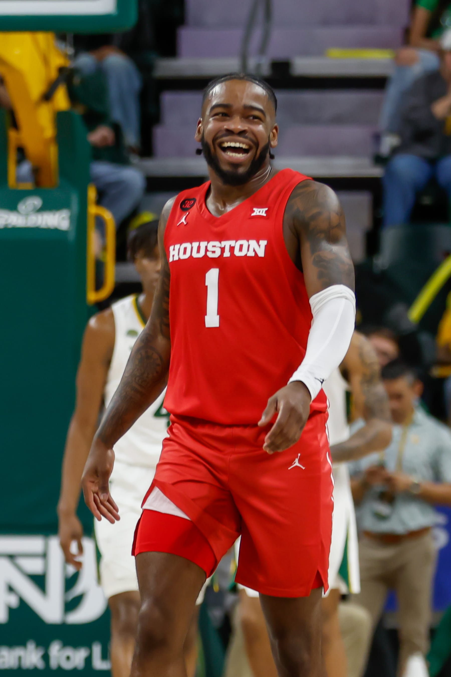 WACO, TX - FEBRUARY 24: Houston Cougars guard Jamal Shead (1) smiles as he comes up court after scoring during the Big 12 college basketball game between Baylor Bears and Houston Cougars on February 24, 2024, at Foster Pavilion in Waco, Texas. (Photo by David Buono/Icon Sportswire via Getty Images)