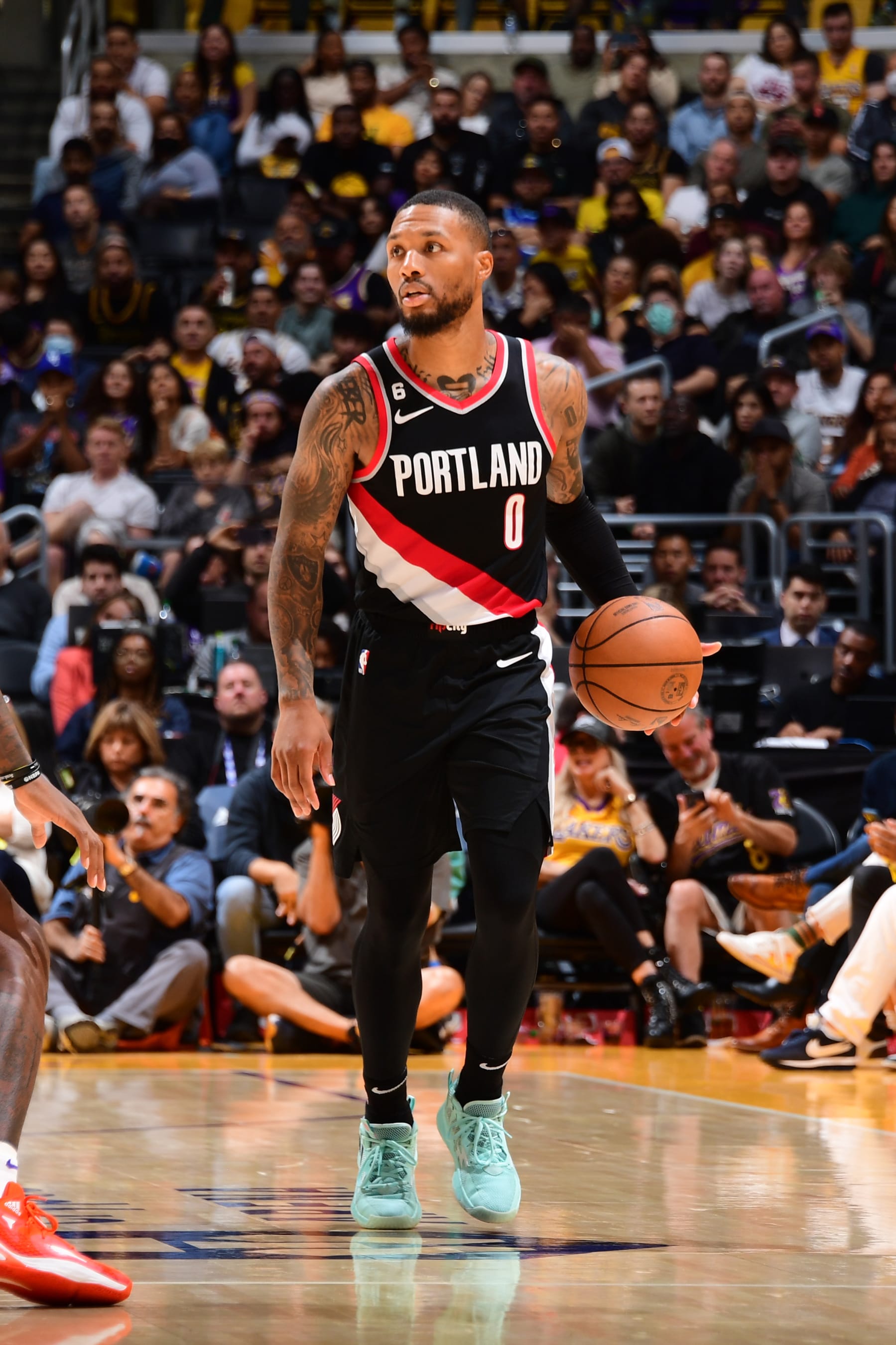 LOS ANGELES, CA - OCTOBER 23: Damian Lillard #0 of the Portland Trail Blazers dribbles the ball during the game against the Los Angeles Lakers on October 23, 2022 at Crypto.Com Arena in Los Angeles, California. NOTE TO USER: User expressly acknowledges and agrees that, by downloading and/or using this Photograph, user is consenting to the terms and conditions of the Getty Images License Agreement. Mandatory Copyright Notice: Copyright 2022 NBAE (Photo by Adam Pantozzi/NBAE via Getty Images)
