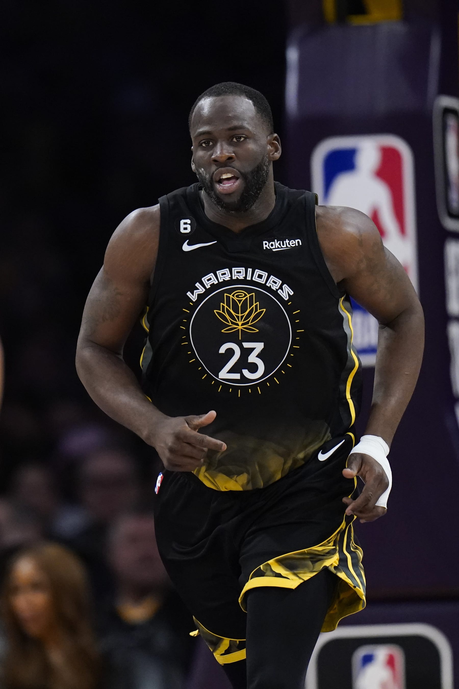 Golden State Warriors' Draymond Green makes his way down the court during the first half of an NBA basketball game against the Los Angeles Lakers Sunday, March 5, 2023, in Los Angeles. (AP Photo/Jae C. Hong)