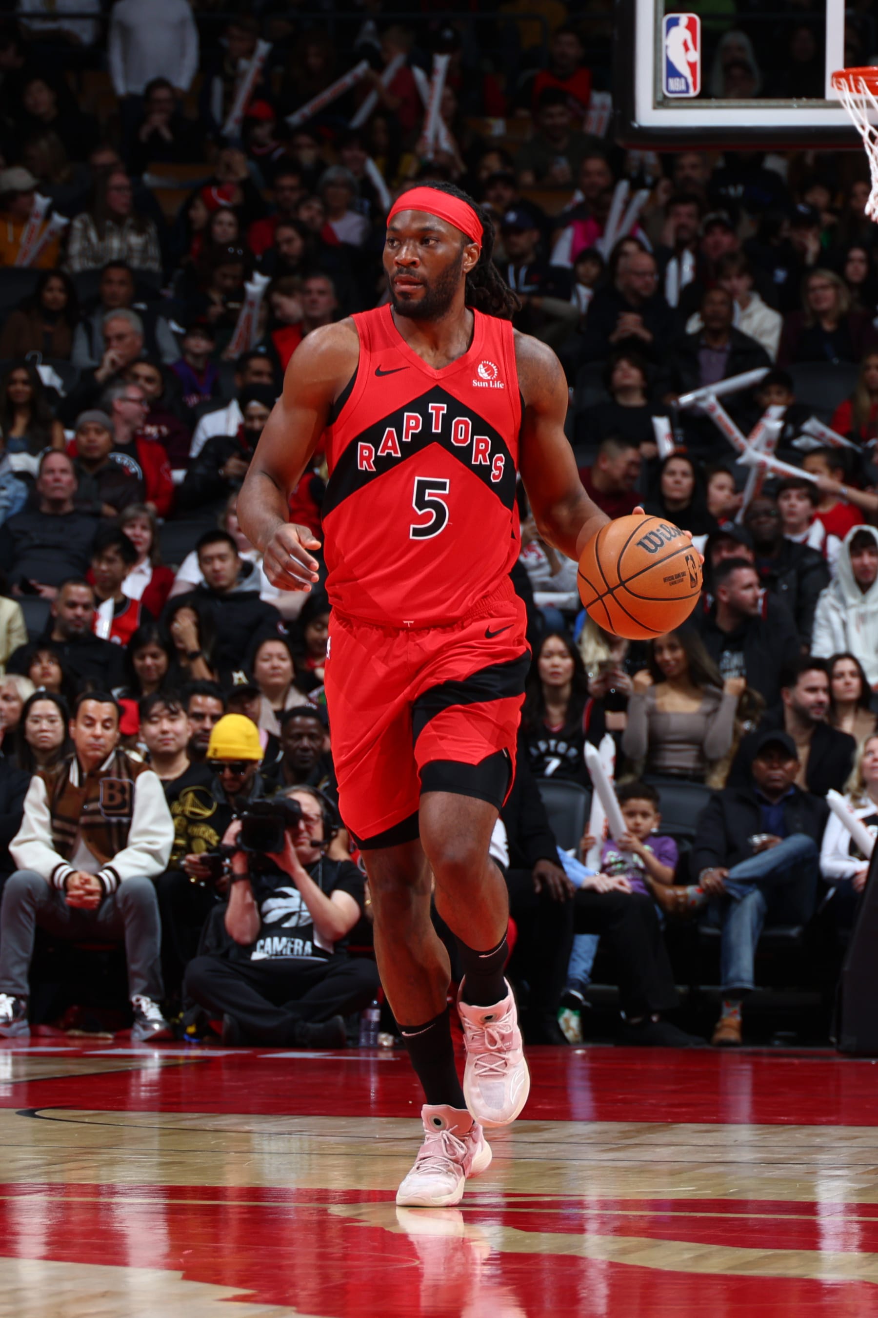TORONTO, CANADA - NOVEMBER 19: Precious Achiuwa #5 of the Toronto Raptors dribbles the ball during the game against the Detroit Pistons on November 19, 2023 at the Scotiabank Arena in Toronto, Ontario, Canada.  NOTE TO USER: User expressly acknowledges and agrees that, by downloading and or using this Photograph, user is consenting to the terms and conditions of the Getty Images License Agreement.  Mandatory Copyright Notice: Copyright 2023 NBAE (Photo by Vaughn Ridley/NBAE via Getty Images)