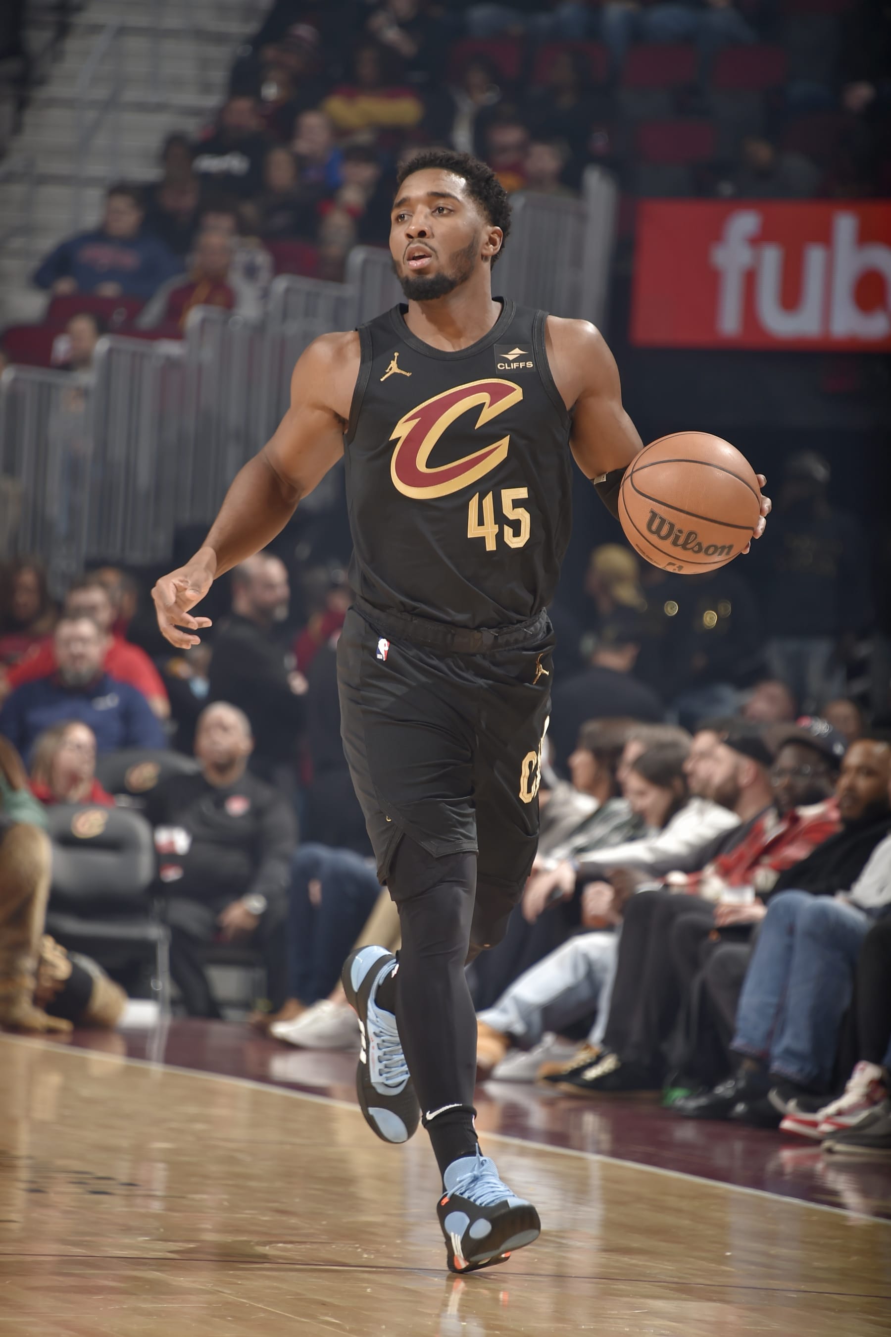 CLEVELAND, OH - DECEMBER 6: Donovan Mitchell #45 of the Cleveland Cavaliers dribbles the ball during the game against the Orlando Magic on December 6, 2023 at Rocket Mortgage FieldHouse in Cleveland, Ohio. NOTE TO USER: User expressly acknowledges and agrees that, by downloading and/or using this Photograph, user is consenting to the terms and conditions of the Getty Images License Agreement. Mandatory Copyright Notice: Copyright 2023 NBAE (Photo by David Liam Kyle/NBAE via Getty Images)