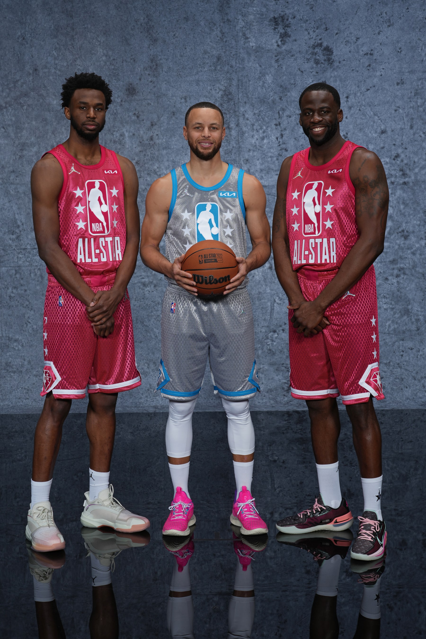 CLEVELAND, OH - FEBRUARY 20: Andrew Wiggins #22, Stephen Curry #30 and Draymond Green #23 of the Golden State Warriors pose for a portrait before the 2022 NBA All-Star Game as part of 2022 NBA All Star Weekend on February 20, 2022 at Rocket Mortgage FieldHouse in Cleveland, Ohio. NOTE TO USER: User expressly acknowledges and agrees that, by downloading and/or using this Photograph, user is consenting to the terms and conditions of the Getty Images License Agreement. Mandatory Copyright Notice: Copyright 2022 NBAE (Photo by Jesse D. Garrabrant/NBAE via Getty Images)