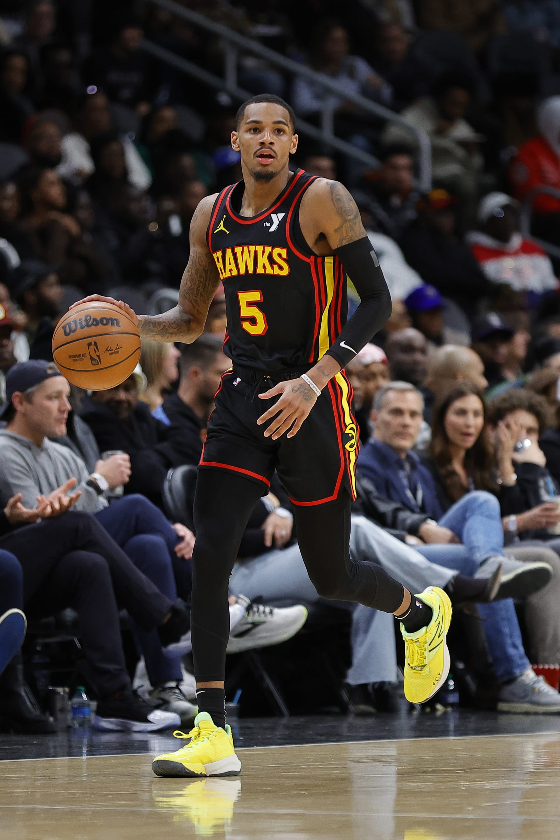 ATLANTA, GEORGIA - JANUARY 20: Dejounte Murray #5 of the Atlanta Hawks drives down court against the Cleveland Cavaliers during the second half at State Farm Arena on January 20, 2024 in Atlanta, Georgia. NOTE TO USER: User expressly acknowledges and agrees that, by downloading and or using this photograph, User is consenting to the terms and conditions of the Getty Images License Agreement. (Photo by Alex Slitz/Getty Images)