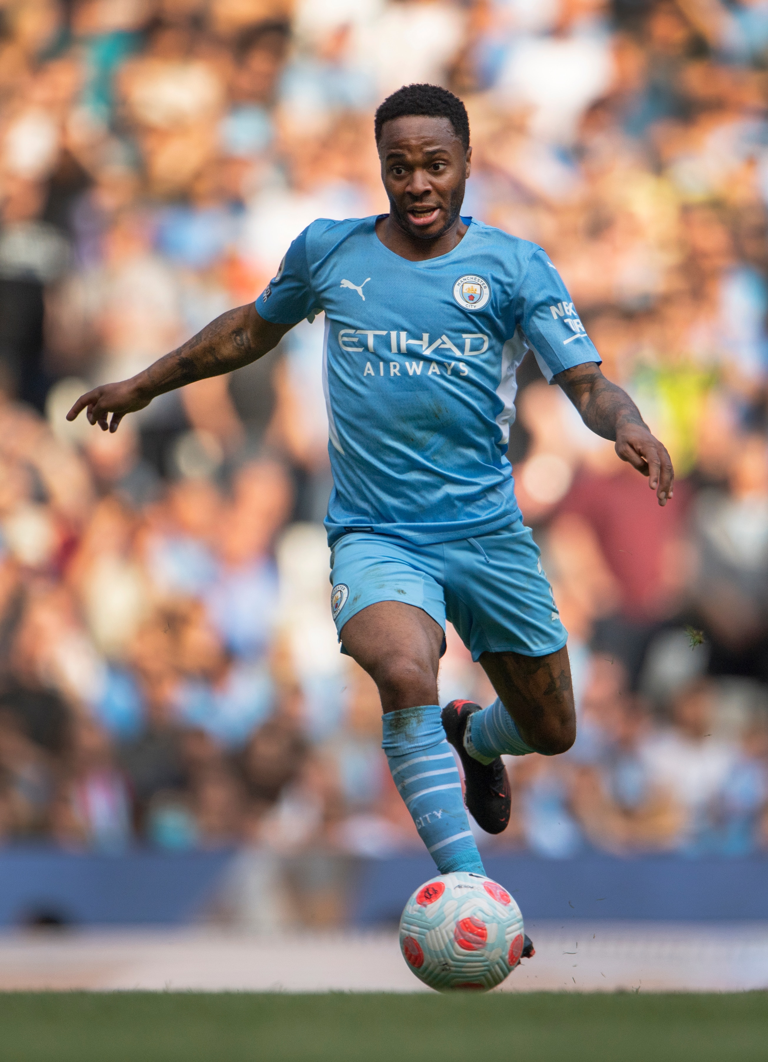 MANCHESTER, ENGLAND - MAY 08: Raheem Sterling  of Manchester City in action during the Premier League match between Manchester City and Newcastle United at Etihad Stadium on May 8, 2022 in Manchester, United Kingdom. (Photo by Visionhaus/Getty Images)