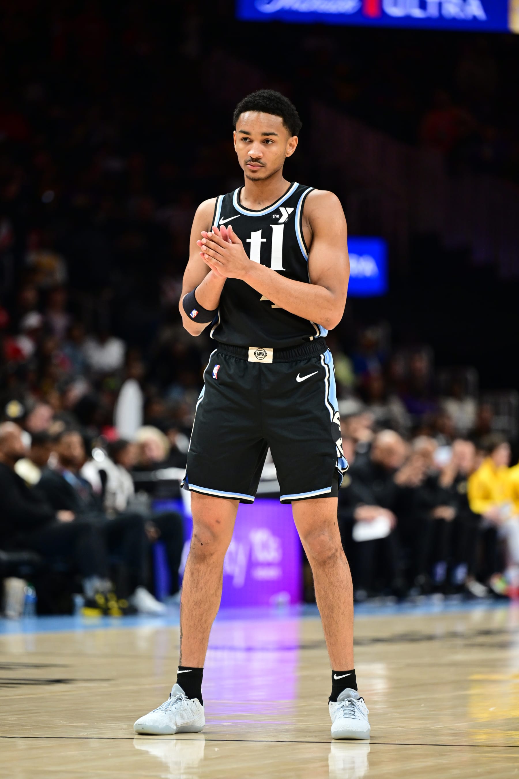 ATLANTA, GA - JANUARY 30: Kobe Bufkin #4 of the Atlanta Hawks looks on during the game against the Los Angeles Lakers on January 30, 2024 at State Farm Arena in Atlanta, Georgia.  NOTE TO USER: User expressly acknowledges and agrees that, by downloading and/or using this Photograph, user is consenting to the terms and conditions of the Getty Images License Agreement. Mandatory Copyright Notice: Copyright 2024 NBAE (Photo by Adam Hagy/NBAE via Getty Images)