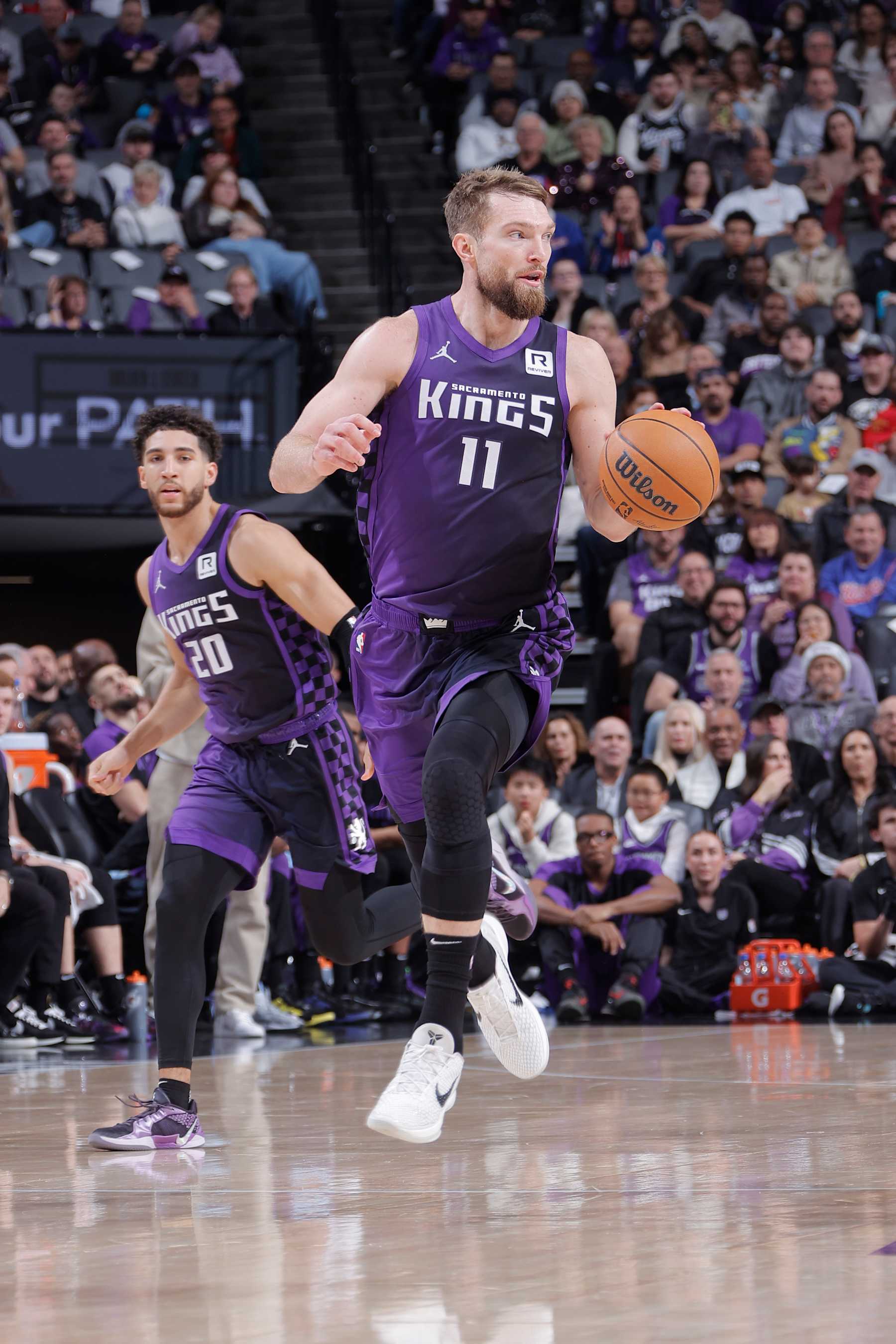 SACRAMENTO, CA - DECEMBER 8: Domantas Sabonis #11 of the Sacramento Kings dribbles the ball during the game against the Utah Jazz on December 8, 2024 at Golden 1 Center in Sacramento, California. NOTE TO USER: User expressly acknowledges and agrees that, by downloading and or using this Photograph, user is consenting to the terms and conditions of the Getty Images License Agreement. Mandatory Copyright Notice: Copyright 2024 NBAE (Photo by Rocky Widner/NBAE via Getty Images)