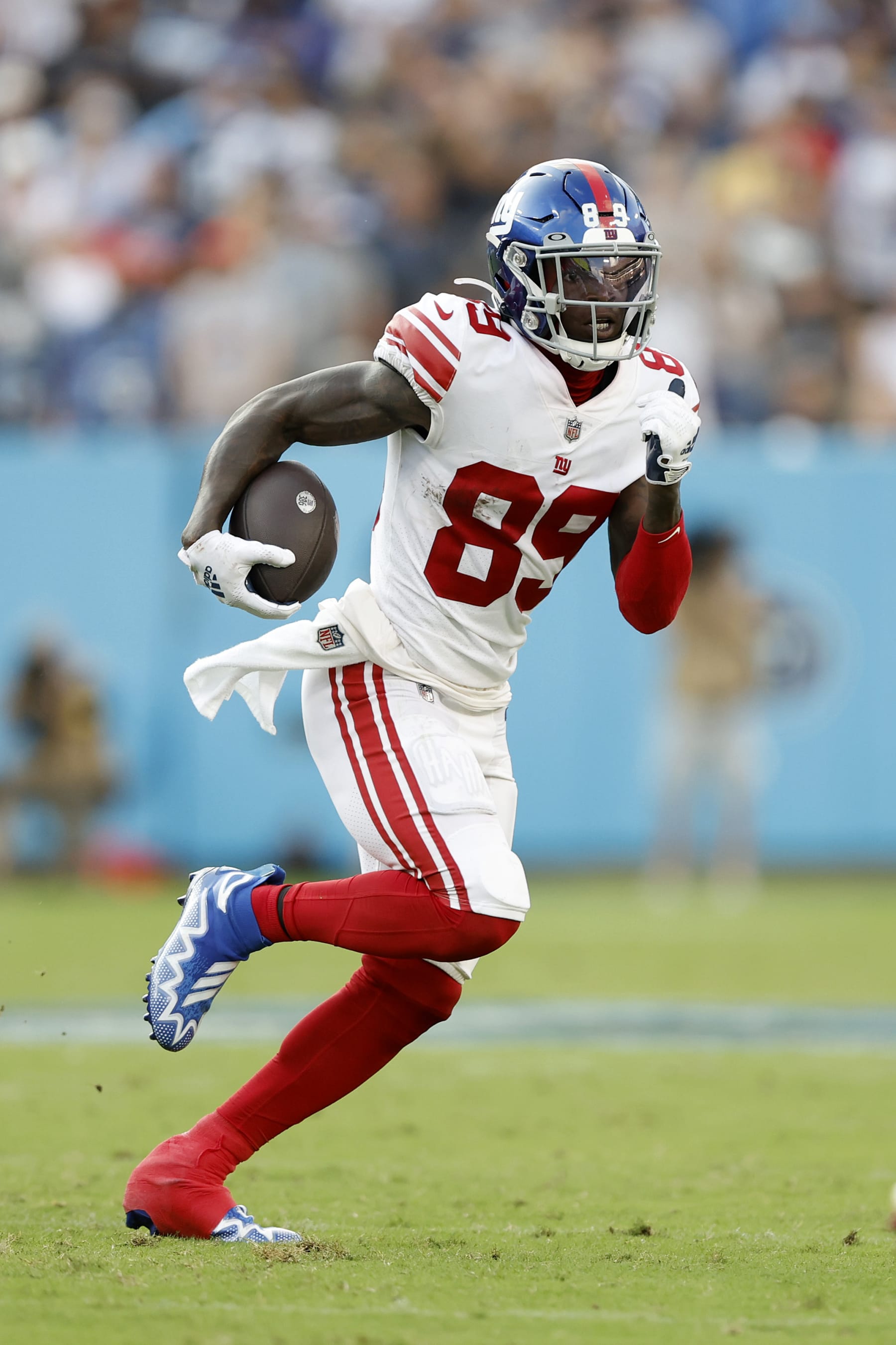 NASHVILLE, TENNESSEE - SEPTEMBER 11: Wide receiver Kadarius Toney #89 of the New York Giants runs upfield during the second half against the Tennessee Titans at Nissan Stadium on September 11, 2022 in Nashville, Tennessee. (Photo by Wesley Hitt/Getty Images)