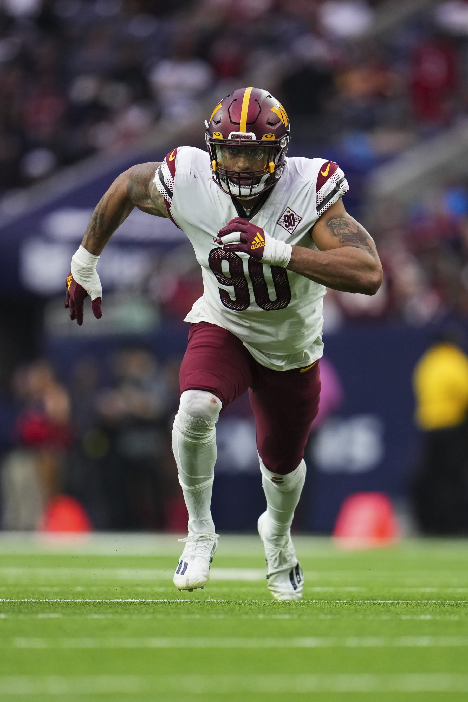 HOUSTON, TX - NOVEMBER 20: Montez Sweat #90 of the Washington Commanders defends against the Houston Texans at NRG Stadium on November 20, 2022 in Houston, Texas. (Photo by Cooper Neill/Getty Images)