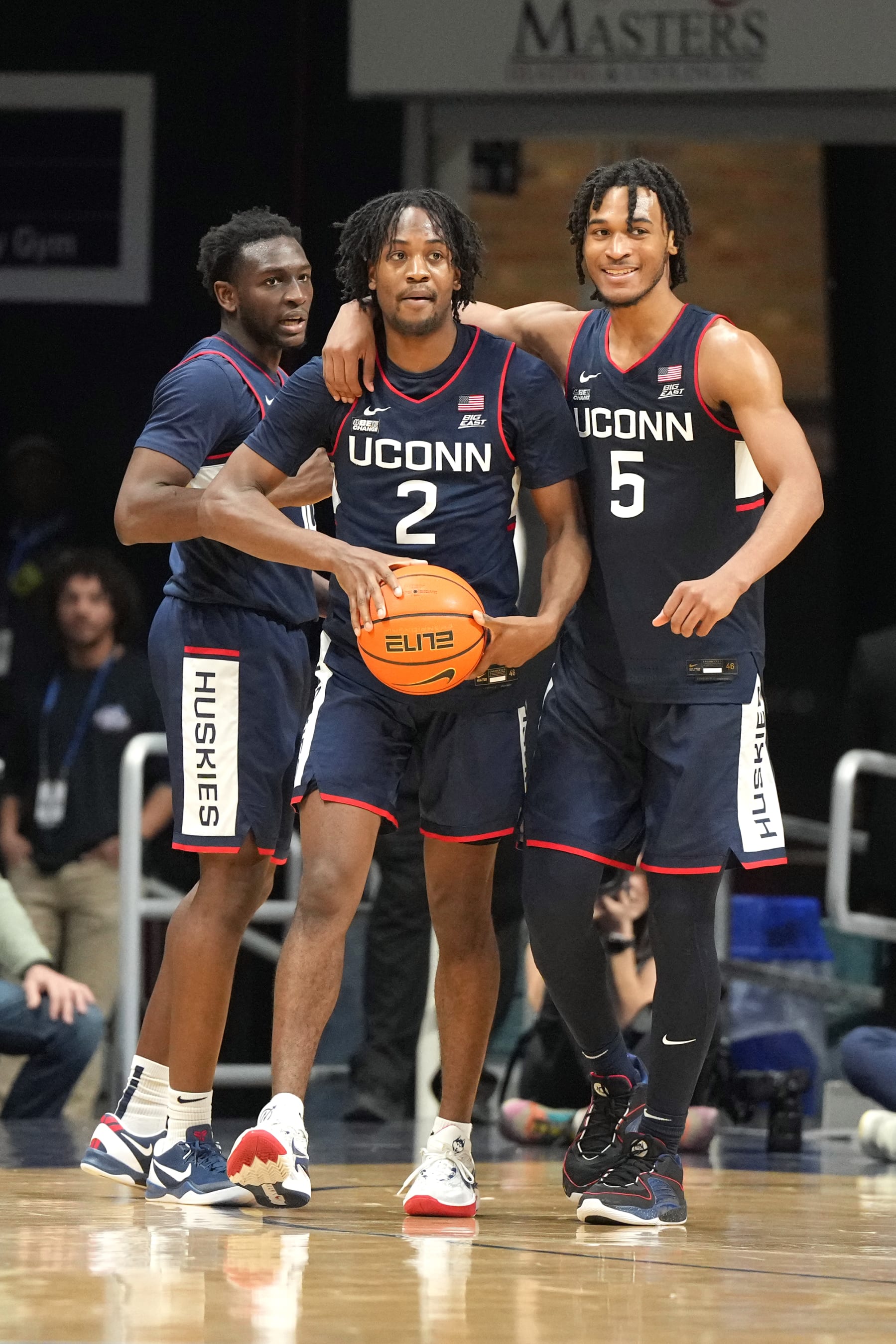 Connecticut's Tristen Newton (2) and Stephon Castle (5)