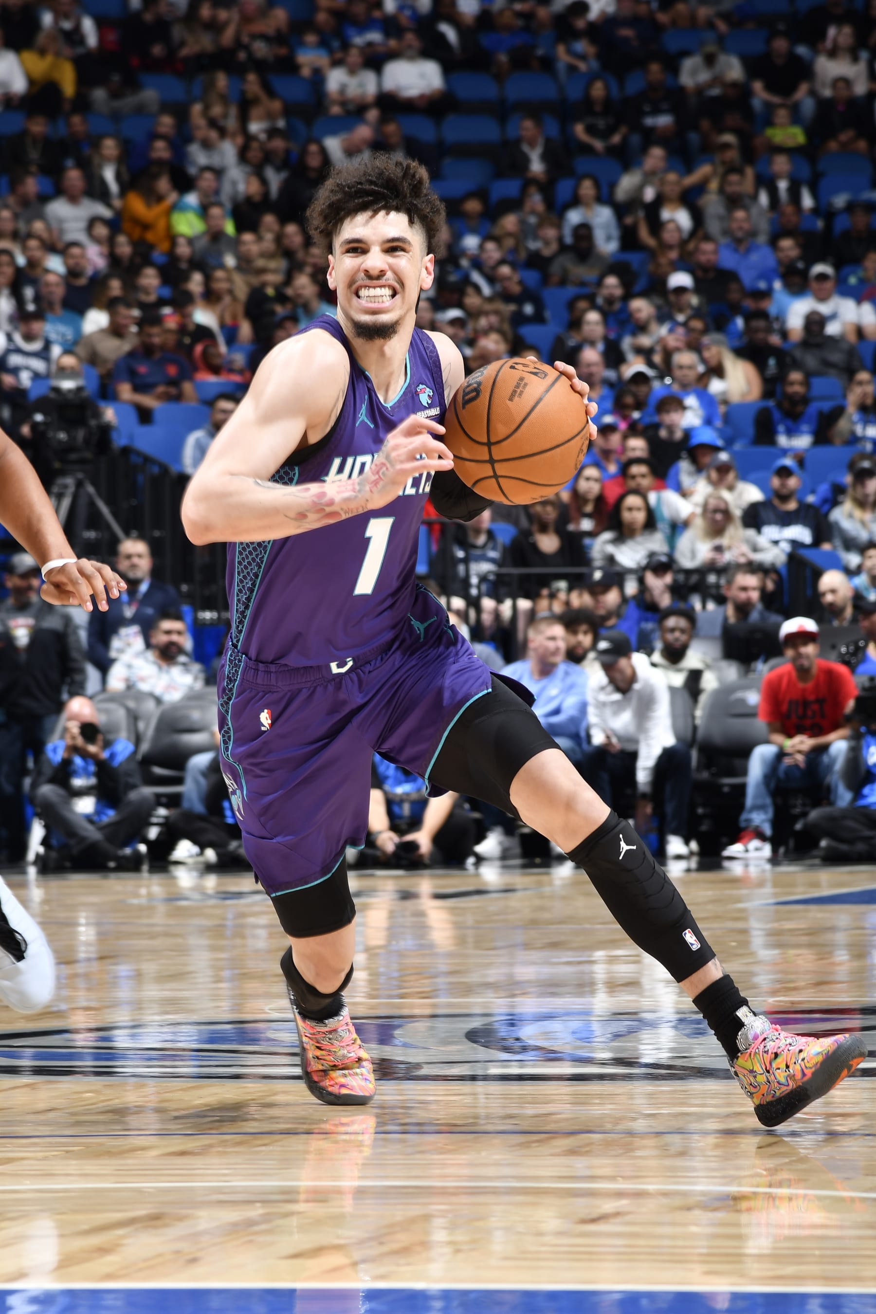 ORLANDO, FL - NOVEMBER 26: LaMelo Ball #1 of the Charlotte Hornets drives to the basket during the game against the Orlando Magic on November 26, 2023 at Amway Center in Orlando, Florida. NOTE TO USER: User expressly acknowledges and agrees that, by downloading and or using this photograph, User is consenting to the terms and conditions of the Getty Images License Agreement. Mandatory Copyright Notice: Copyright 2023 NBAE (Photo by Fernando Medina/NBAE via Getty Images)