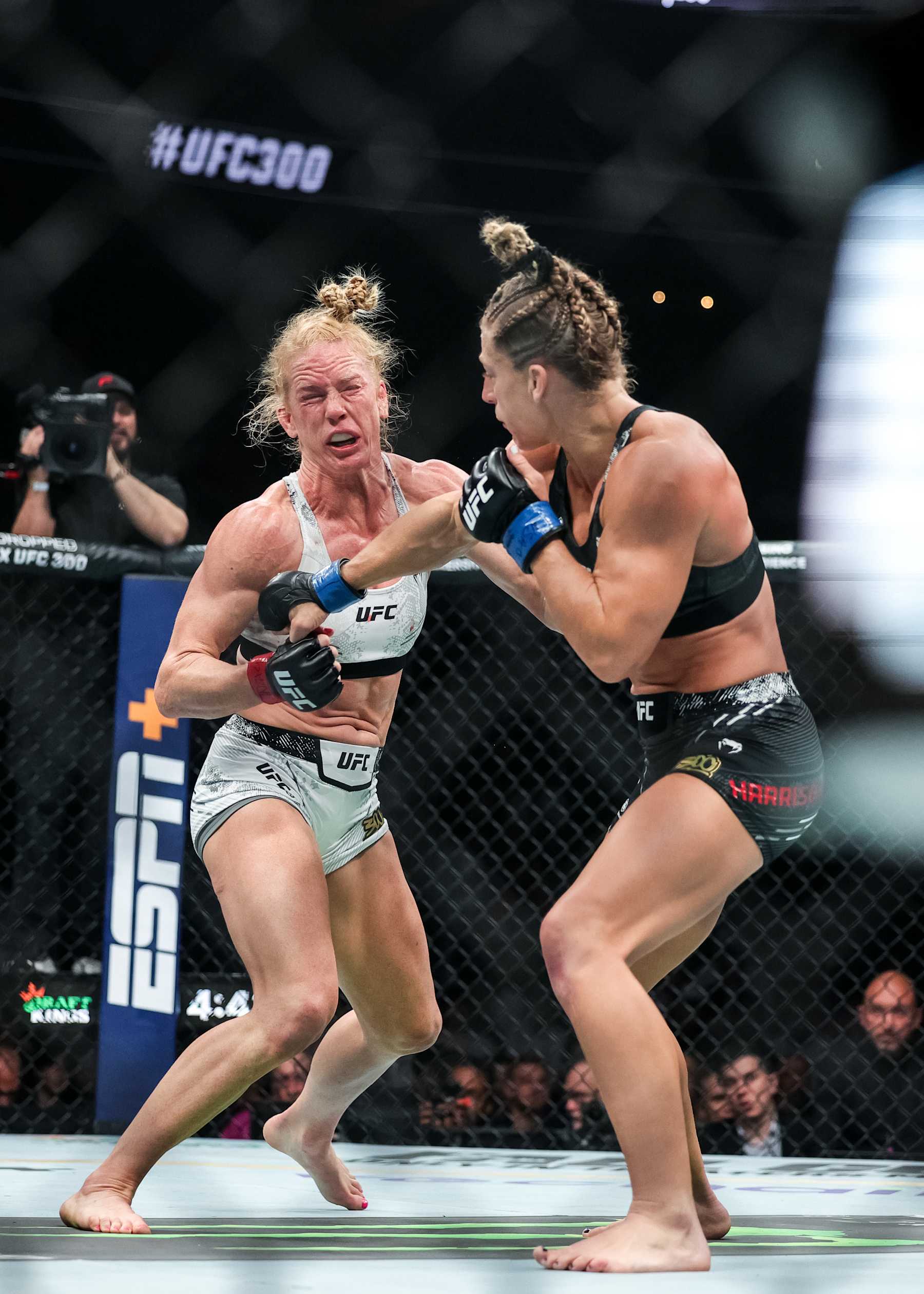 Kayla Harrison punches Holly Holm