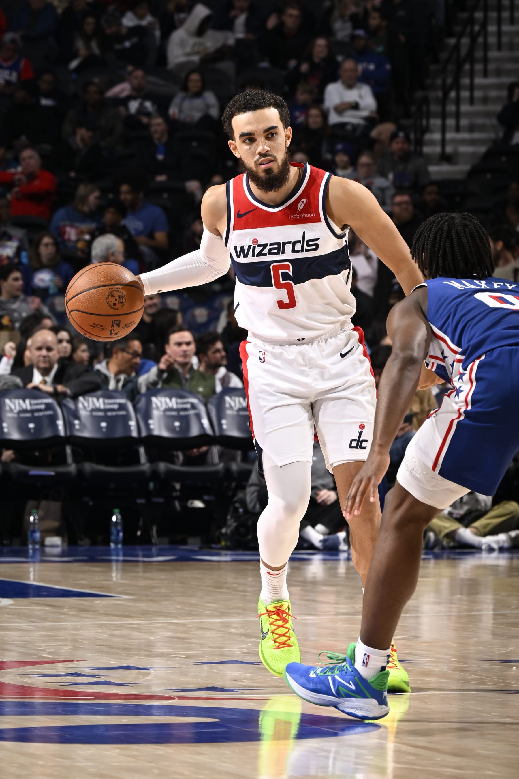 PHILADELPHIA, PA - DECEMBER 11: Tyus Jones #5 of the Washington Wizards dribbles the ball during the game against the Philadelphia 76ers on December 11, 2023 at the Wells Fargo Center in Philadelphia, Pennsylvania NOTE TO USER: User expressly acknowledges and agrees that, by downloading and/or using this Photograph, user is consenting to the terms and conditions of the Getty Images License Agreement. Mandatory Copyright Notice: Copyright 2023 NBAE (Photo by David Dow/NBAE via Getty Images)