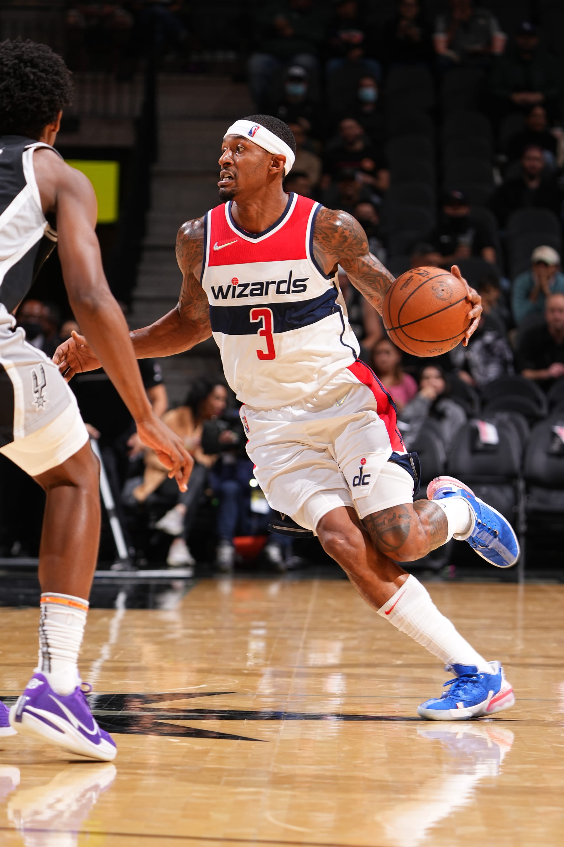 SAN ANTONIO, TX - NOVEMBER 29: Bradley Beal #3 of the Washington Wizards handles the ball against the San Antonio Spurs on November 29, 2021 at the AT&T Center in San Antonio, Texas. NOTE TO USER: User expressly acknowledges and agrees that, by downloading and/or using this Photograph, user is consenting to the terms and conditions of the Getty Images License Agreement. Mandatory Copyright Notice: Copyright 2021 NBAE (Photo by Garrett Ellwood/NBAE via Getty Images)