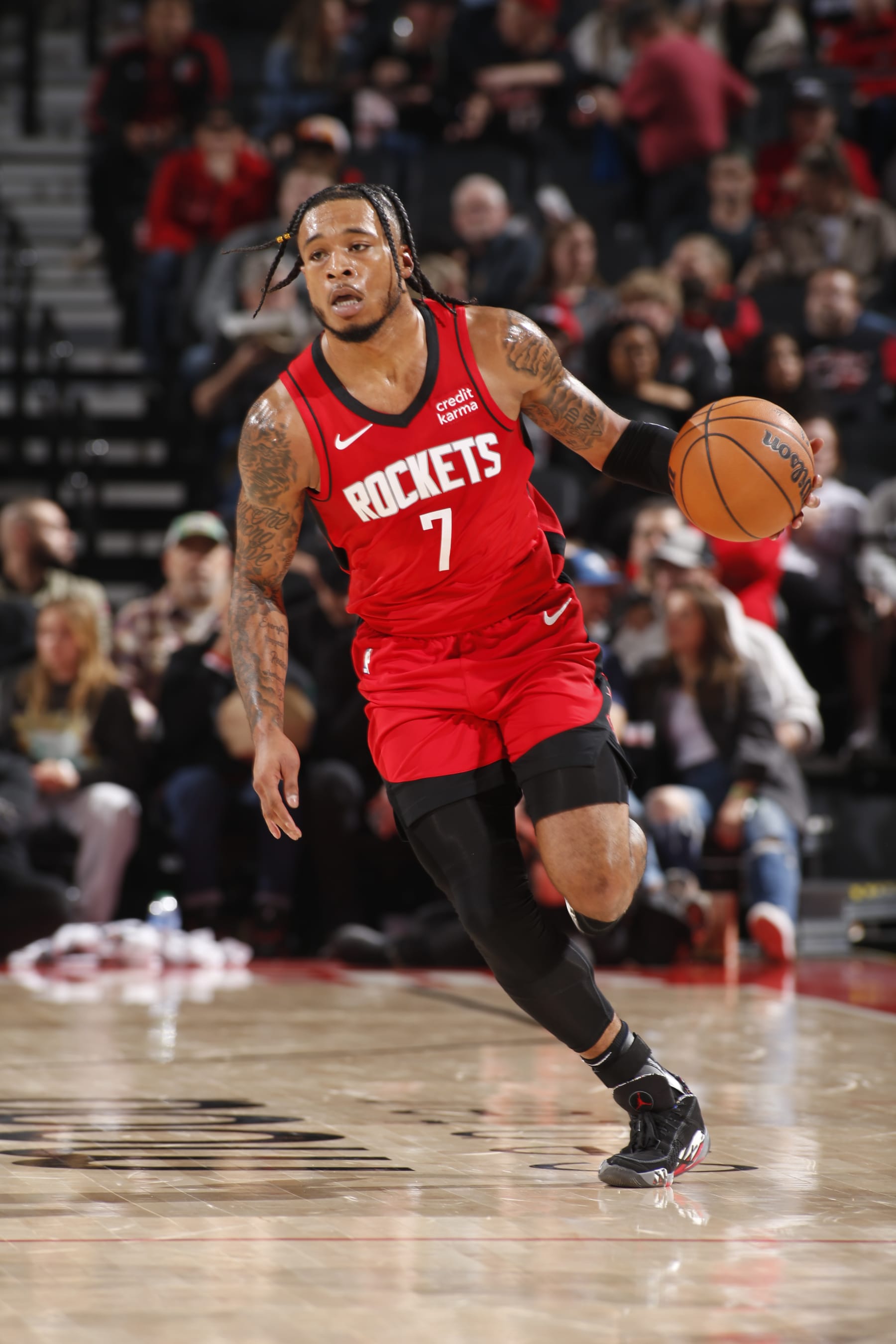 PORTLAND, OR - APRIL 12: Cam Whitmore #7 of the Houston Rockets handles the ball during the game against the Portland Trail Blazers on April 12, 2024 at the Moda Center Arena in Portland, Oregon. NOTE TO USER: User expressly acknowledges and agrees that, by downloading and or using this photograph, user is consenting to the terms and conditions of the Getty Images License Agreement. Mandatory Copyright Notice: Copyright 2024 NBAE (Photo by Cameron Browne/NBAE via Getty Images)
