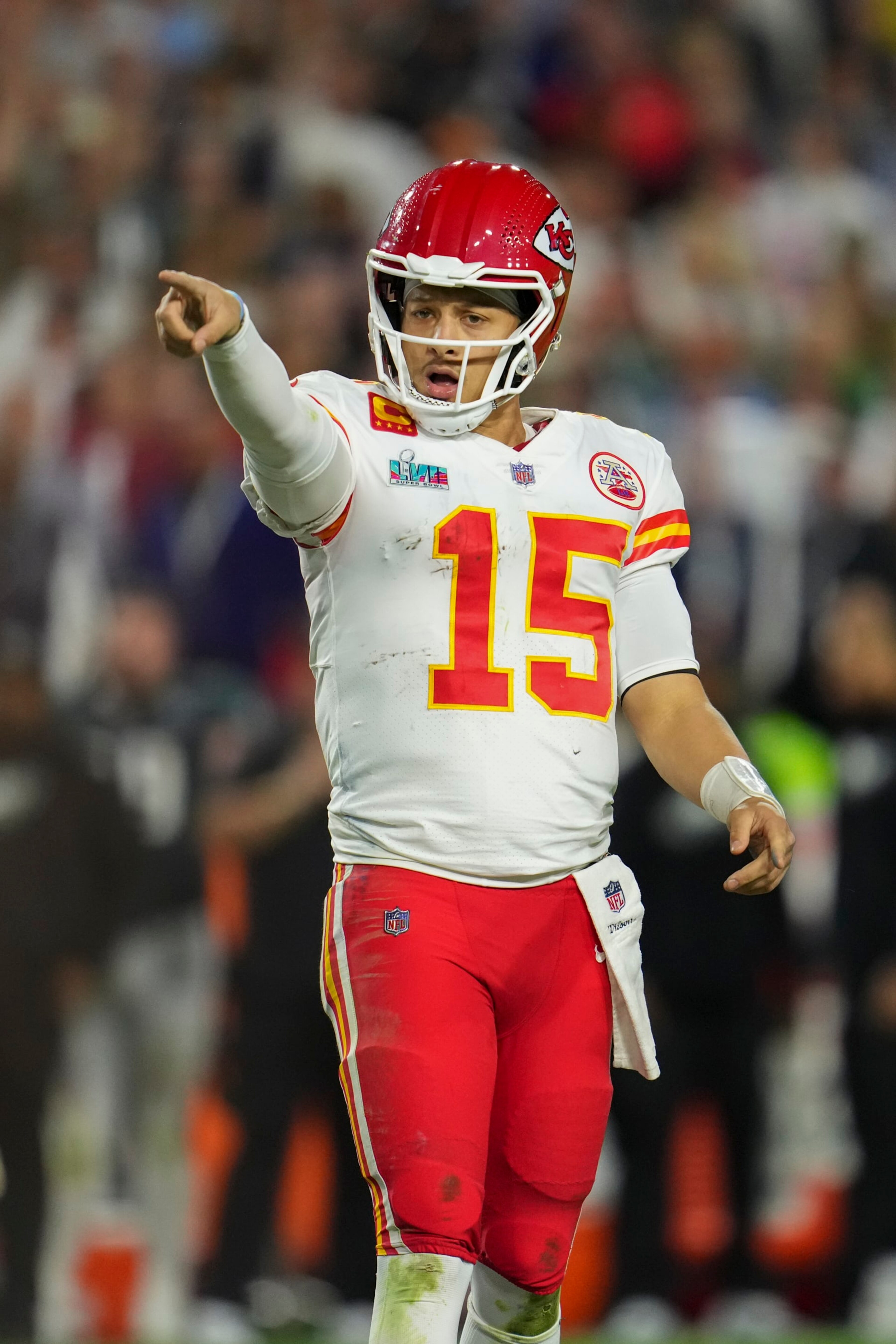 GLENDALE, AZ - FEBRUARY 12: Patrick Mahomes #15 of the Kansas City Chiefs points down field against the Philadelphia Eagles after Super Bowl LVII at State Farm Stadium on February 12, 2023 in Glendale, Arizona. The Chiefs defeated the Eagles 38-35. (Photo by Cooper Neill/Getty Images)