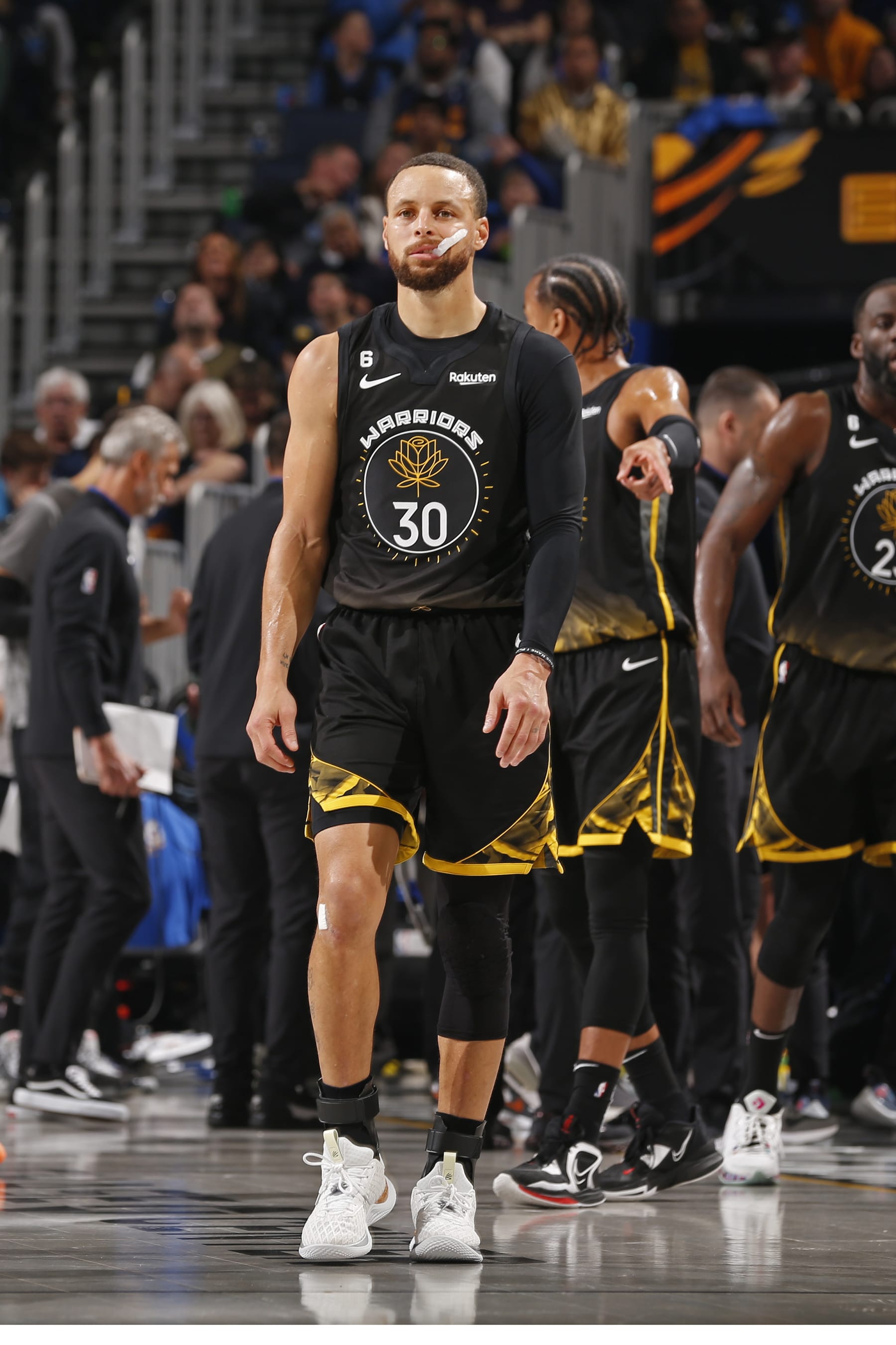 SAN FRANCISCO, CA - MARCH 11: Stephen Curry #30 of the Golden State Warriors looks on during the game against the Milwaukee Bucks on March 11, 2023 at Chase Center in San Francisco, California. NOTE TO USER: User expressly acknowledges and agrees that, by downloading and or using this photograph, user is consenting to the terms and conditions of Getty Images License Agreement. Mandatory Copyright Notice: Copyright 2023 NBAE (Photo by Jed Jacobsohn/NBAE via Getty Images)