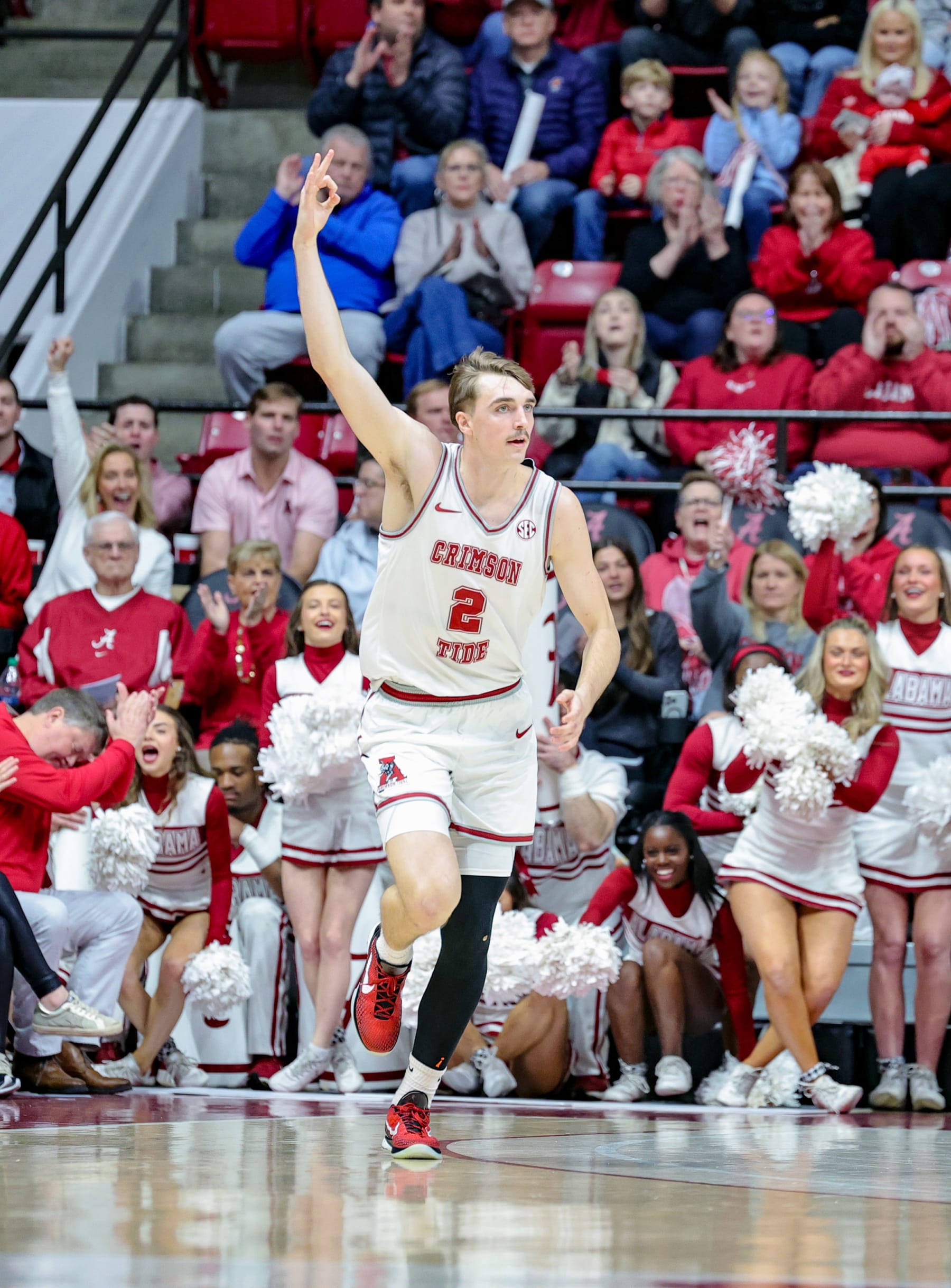 TUSCALOOSA, ALABAMA - FEBRUARY 17: Grant Nelson #2 of the Alabama Crimson Tide reacts to knocking down a first half three against the Texas A&M Aggies at Coleman Coliseum on February 17, 2024 in Tuscaloosa, Alabama. (Photo by Brandon Sumrall/Getty Images)