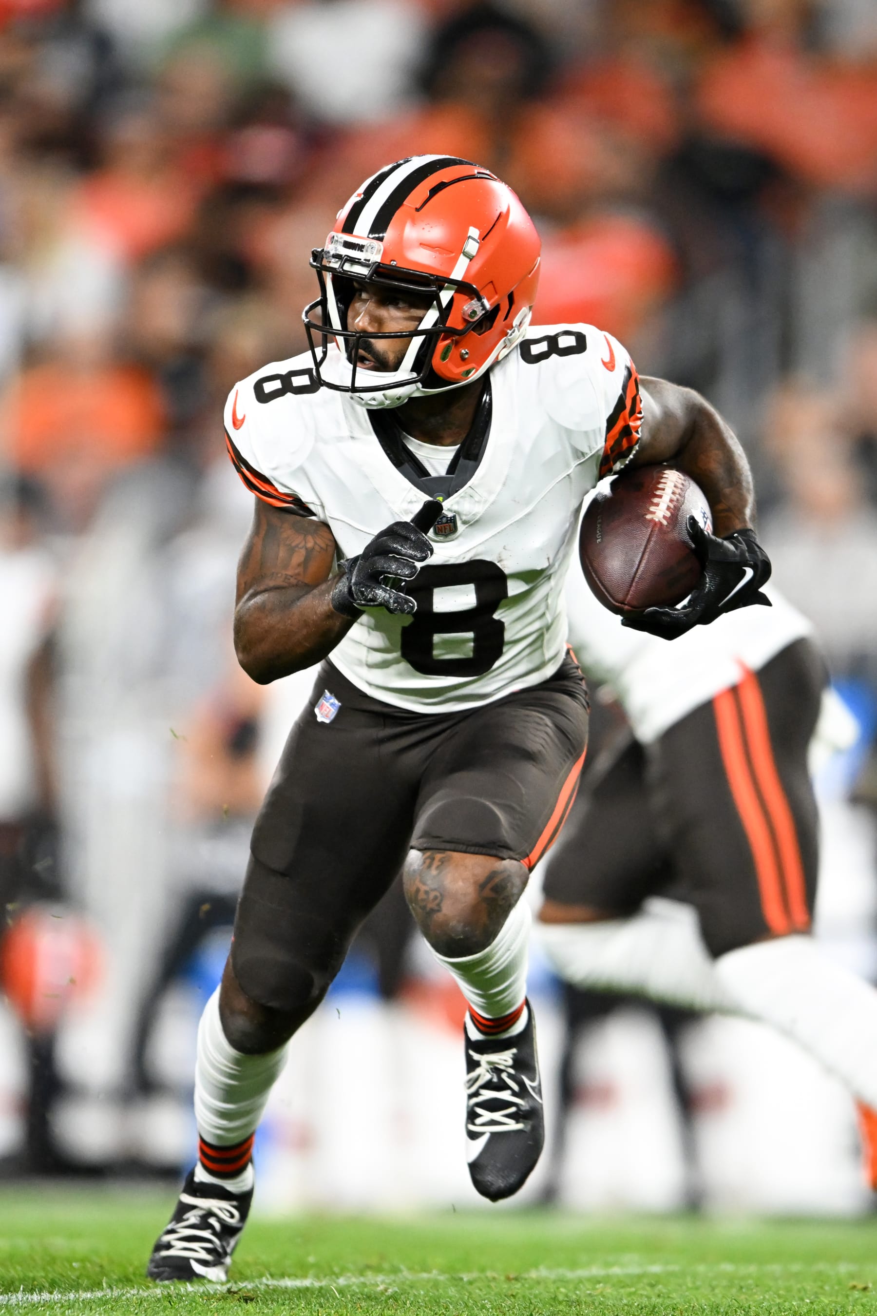 CLEVELAND, OHIO - AUGUST 11: Elijah Moore #8 of the Cleveland Browns carries the ball during the first half of a preseason game against the Washington Commanders at Cleveland Browns Stadium on August 11, 2023 in Cleveland, Ohio. (Photo by Nick Cammett/Getty Images)