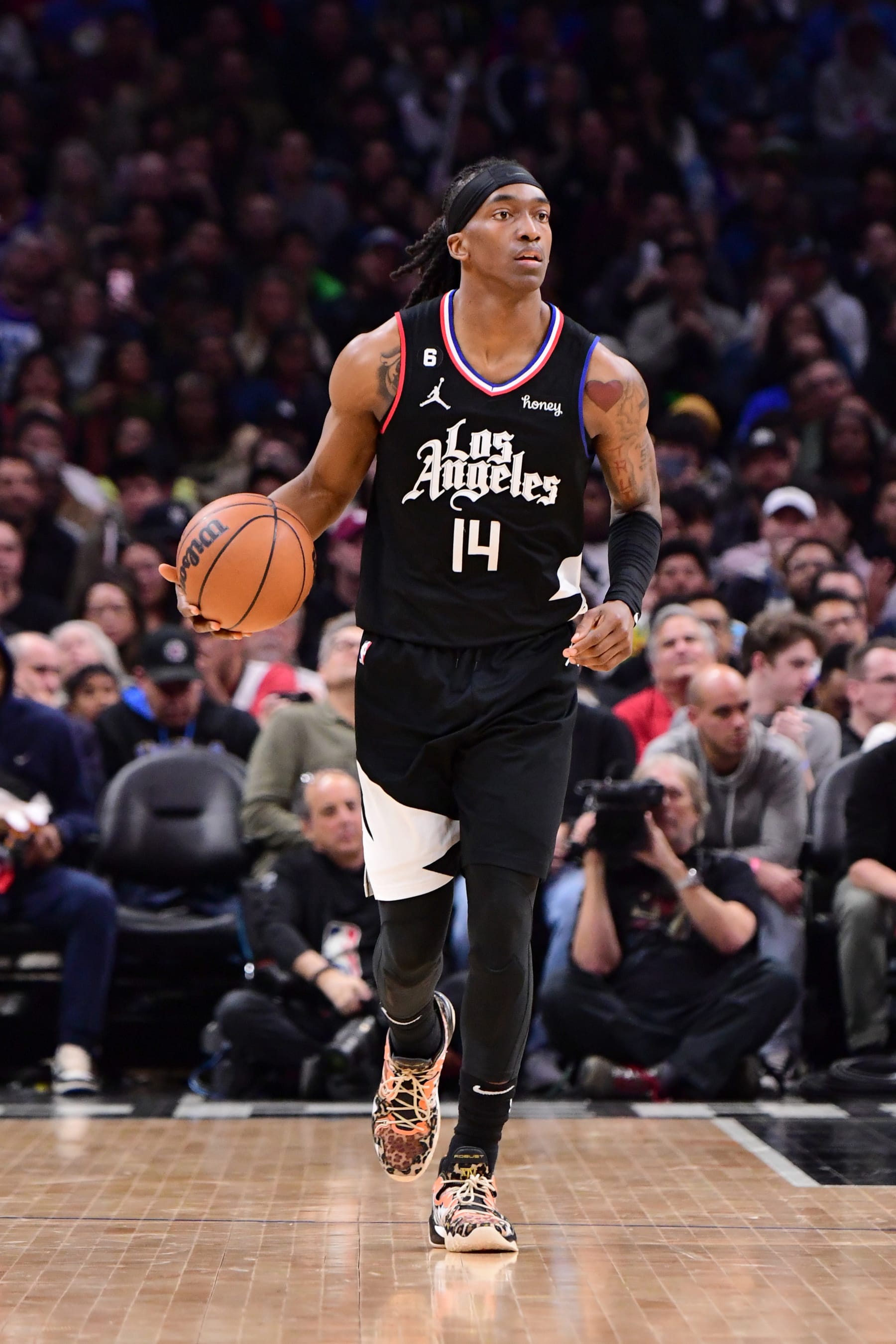 LOS ANGELES, CA - FEBRUARY 8: Terance Mann #14 of the LA Clippers dribbles the ball during the game against the Dallas Mavericks on February 8, 2023 at Crypto.Com Arena in Los Angeles, California. NOTE TO USER: User expressly acknowledges and agrees that, by downloading and/or using this Photograph, user is consenting to the terms and conditions of the Getty Images License Agreement. Mandatory Copyright Notice: Copyright 2023 NBAE (Photo by Adam Pantozzi/NBAE via Getty Images)