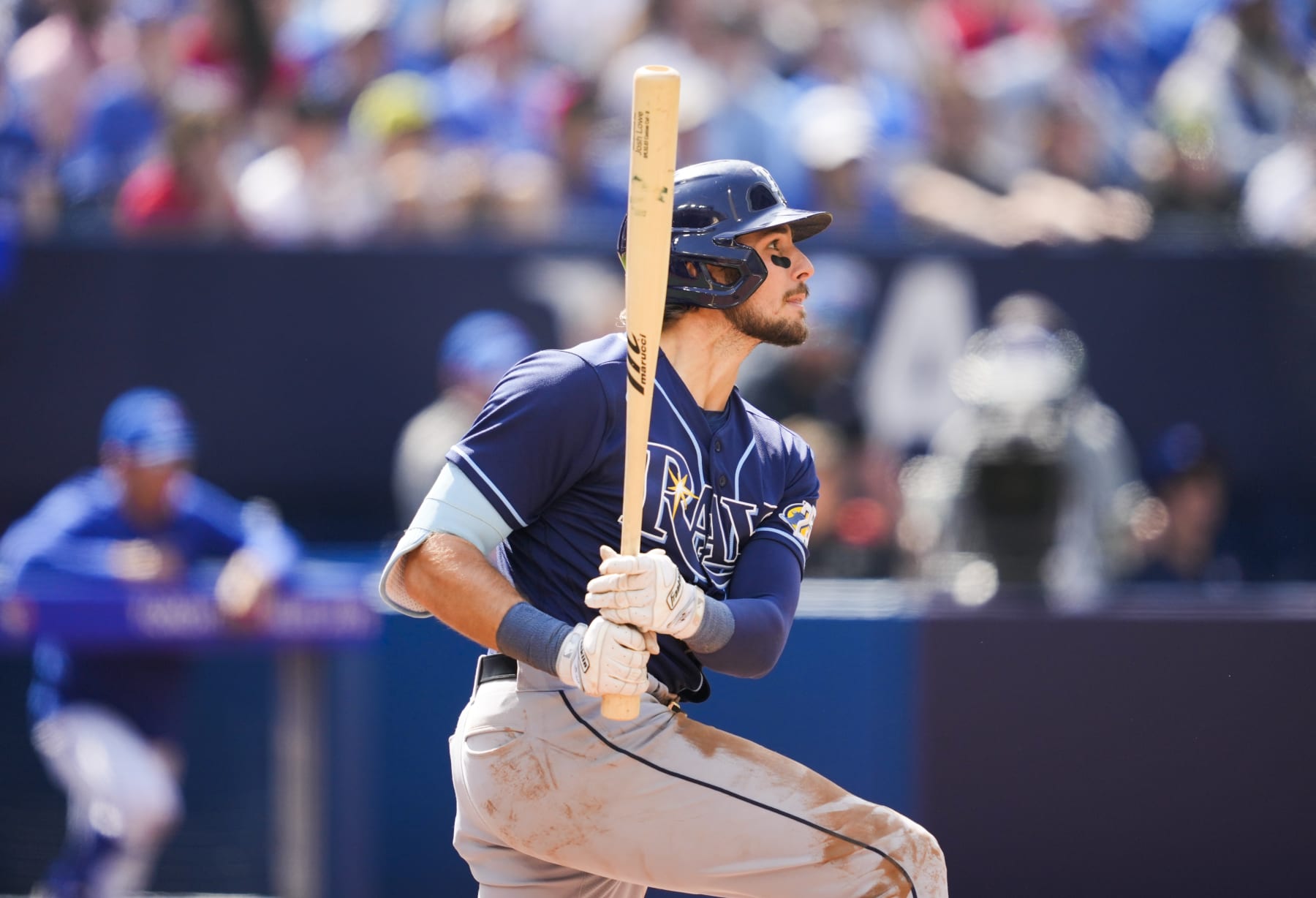 TORONTO, ON - APRIL 16: Josh Lowe #15 of the Tampa Bay Rays hits an RBI double against the Tampa Bay Rays in the fifth inning during their MLB game at the Rogers Centre on April 16, 2023 in Toronto, Ontario, Canada. (Photo by Mark Blinch/Getty Images)