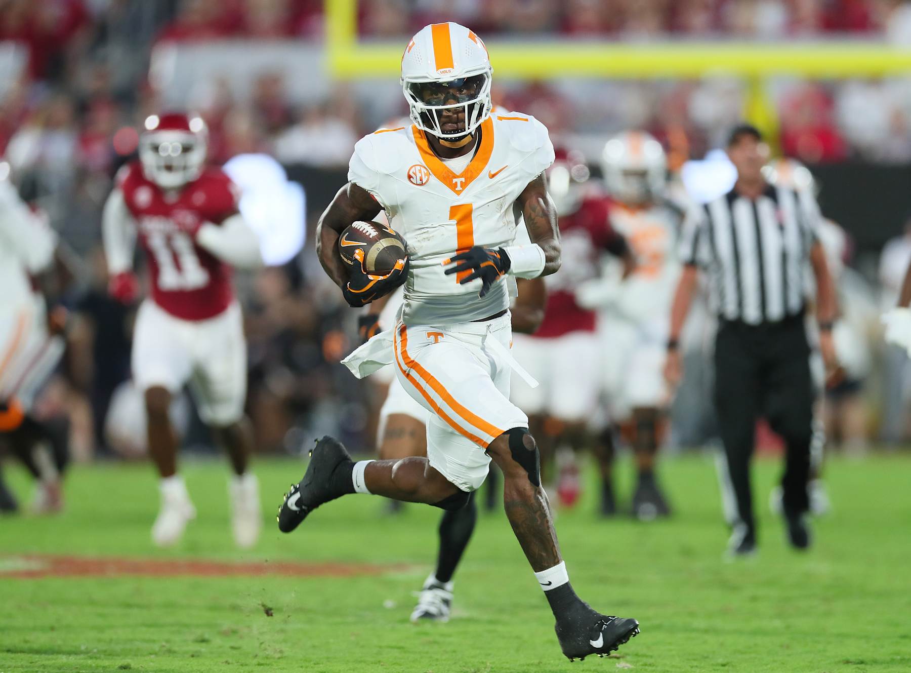NORMAN, OK - SEPTEMBER 21:  Tennessee Volunteers WR Dont'e Thornton Jr. (01) running past the defense for the touchdown during a game between the Oklahoma Sooners and the Tennessee Volunteers at Gaylord Memorial Stadium in Norman, Oklahoma on September 21, 2024. (Photo by David Stacy/Icon Sportswire via Getty Images)