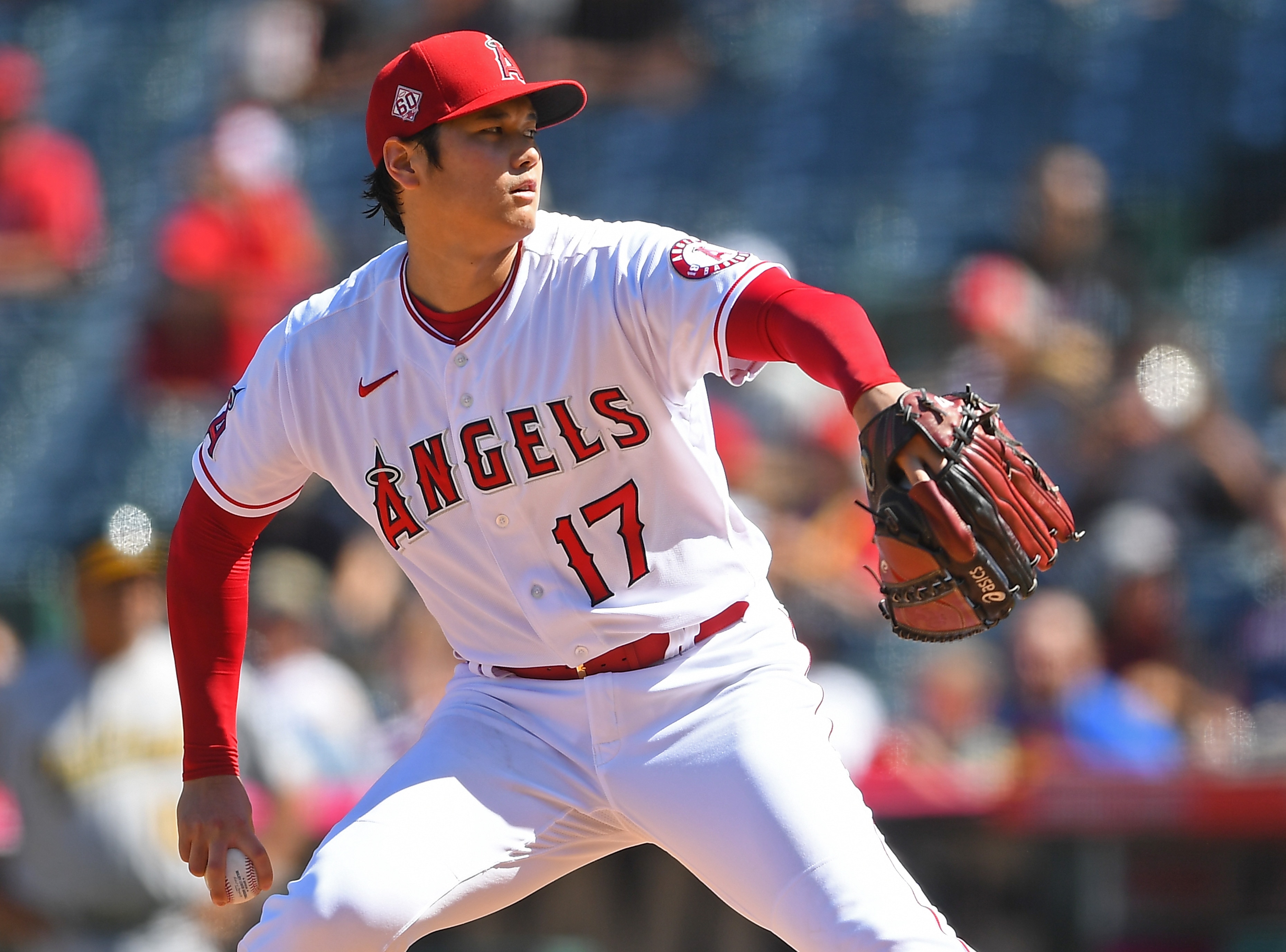 ANAHEIM, CA - SEPTEMBER 19:  Shohei Ohtani #17 of the Los Angeles Angels pitches in the game against the Oakland Athletics at Angel Stadium of Anaheim on September 19, 2021 in Anaheim, California. (Photo by Jayne Kamin-Oncea/Getty Images)