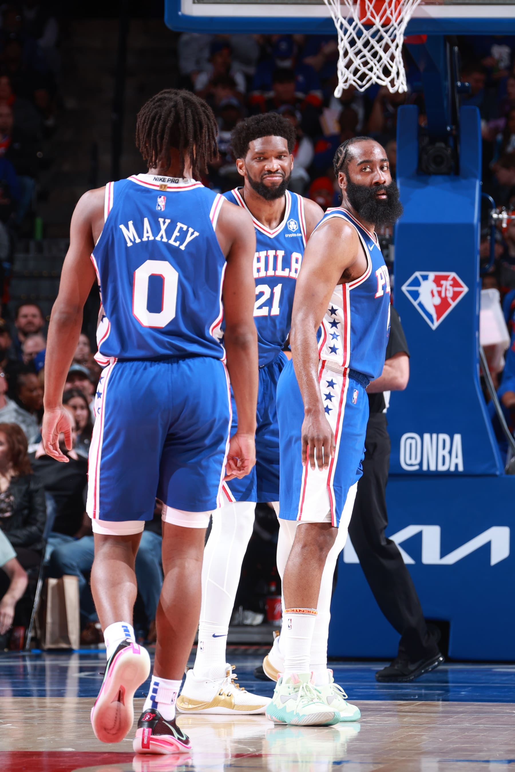 PHILADELPHIA, PA - MARCH 10: Joel Embiid #21 and James Harden #1 of the Philadelphia 76ers embrace Tyrese Maxey #0 during the game against the Brooklyn Nets on March 10, 2022 at the Wells Fargo Center in Philadelphia, Pennsylvania NOTE TO USER: User expressly acknowledges and agrees that, by downloading and/or using this Photograph, user is consenting to the terms and conditions of the Getty Images License Agreement. Mandatory Copyright Notice: Copyright 2022 NBAE (Photo by Nathaniel S. Butler/NBAE via Getty Images)