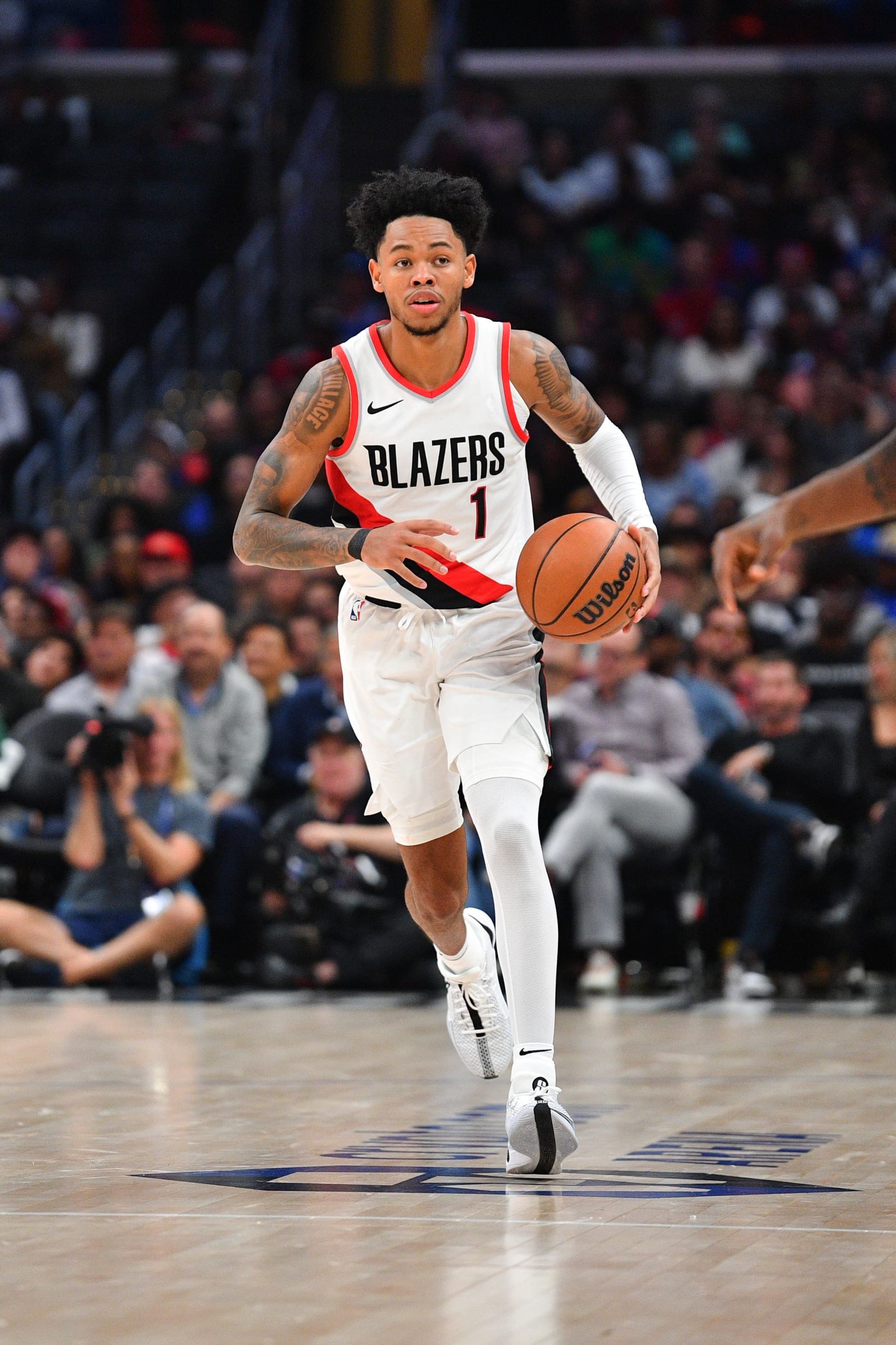 LOS ANGELES, CA - OCTOBER 25: Portland Trail Blazers guard Anfernee Simons (1) dribbles up the court during a NBA  game between the Denver Nuggets and the Portland Trail Blazers on October 25, 2023 at Crypto.com Arena in Los Angeles, CA. (Photo by Brian Rothmuller/Icon Sportswire via Getty Images)