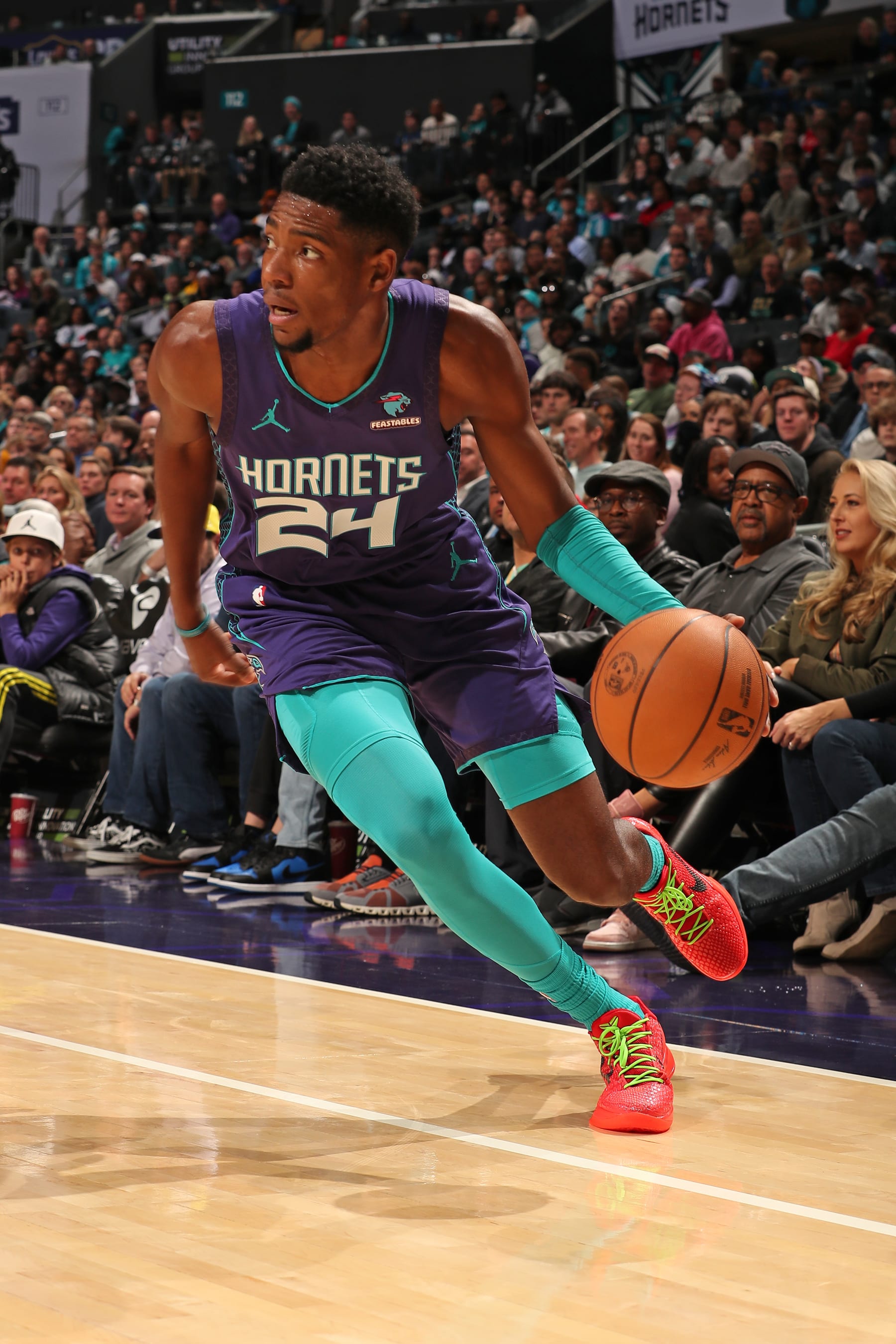 CHARLOTTE, NC - DECEMBER 23: Brandon Miller #24 of the Charlotte Hornets drives to the basket during the game against the Denver Nuggets on December 23, 2023 at Spectrum Center in Charlotte, North Carolina. NOTE TO USER: User expressly acknowledges and agrees that, by downloading and or using this photograph, User is consenting to the terms and conditions of the Getty Images License Agreement. Mandatory Copyright Notice: Copyright 2023 NBAE (Photo by Kent Smith/NBAE via Getty Images)