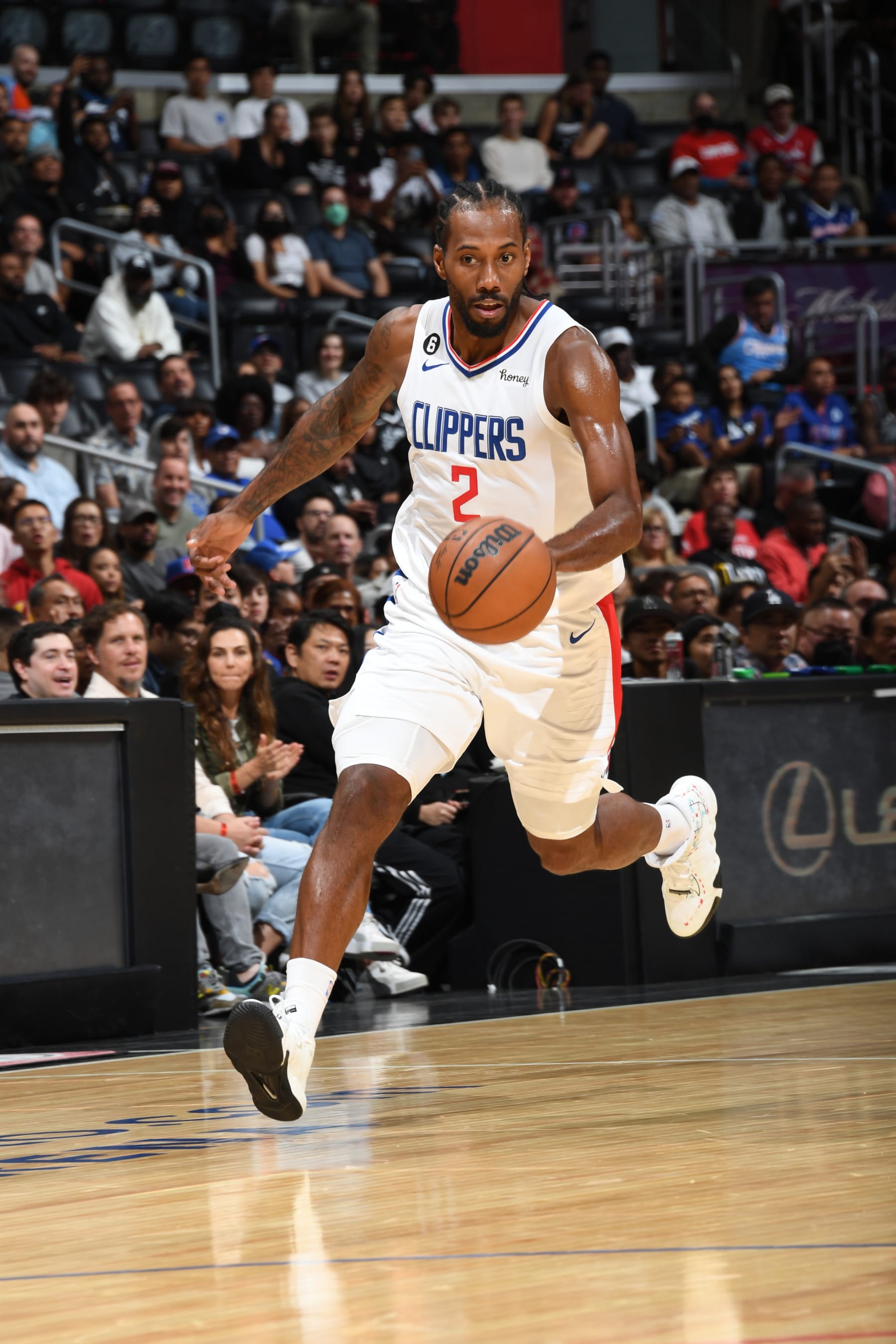 LOS ANGELES, CA - OCTOBER 9: Kawhi Leonard #2 of the LA Clippers dribbles the ball during a preseason game against the Minnesota Timberwolves on October 9, 2022 at Crypto.com Arena in Los Angeles, California. NOTE TO USER: User expressly acknowledges and agrees that, by downloading and/or using this Photograph, user is consenting to the terms and conditions of the Getty Images License Agreement. Mandatory Copyright Notice: Copyright 2022 NBAE (Photo by Andrew D. Bernstein/NBAE via Getty Images)