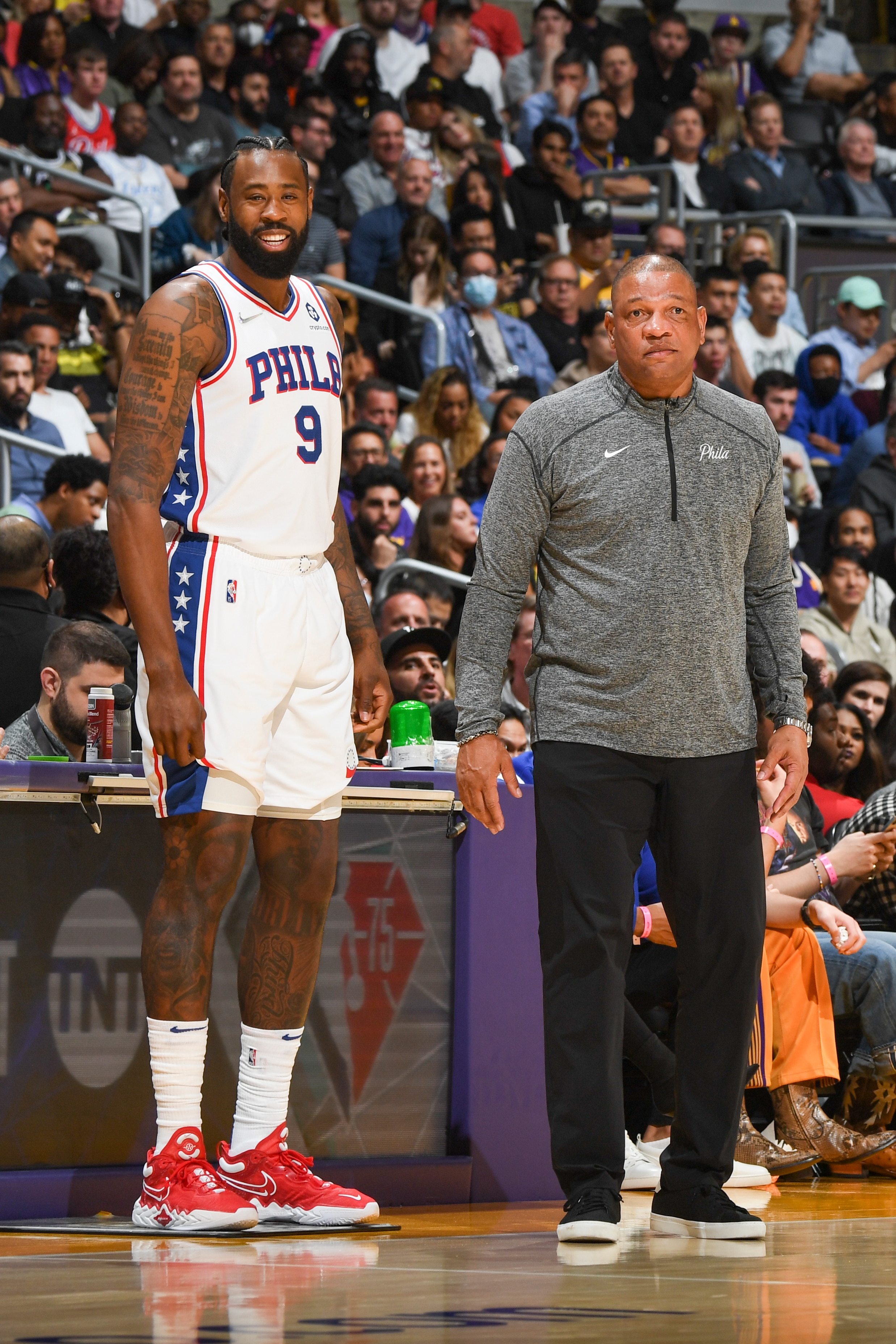 LOS ANGELES, CA - MARCH 23: DeAndre Jordan #9 of the Philadelphia 76ers and Head Coach Doc Rivers of the Philadelphia 76ers look on during the game against the Los Angeles Lakers on March 23, 2022 at Crypto.Com Arena in Los Angeles, California. NOTE TO USER: User expressly acknowledges and agrees that, by downloading and/or using this Photograph, user is consenting to the terms and conditions of the Getty Images License Agreement. Mandatory Copyright Notice: Copyright 2022 NBAE (Photo by Andrew D. Bernstein/NBAE via Getty Images)