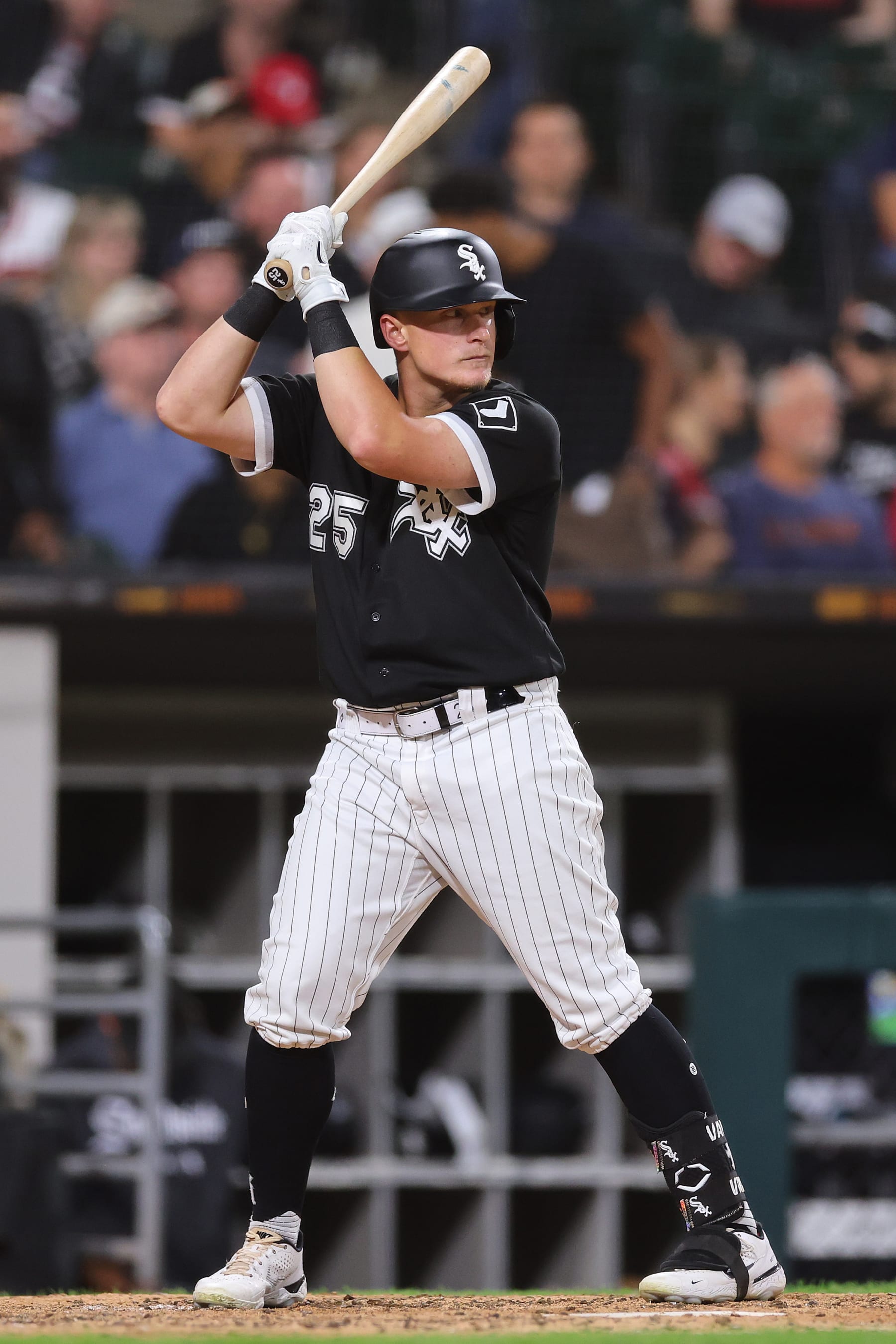 CHICAGO, ILLINOIS - SEPTEMBER 21: Andrew Vaughn #25 of the Chicago White Sox at bat against the Cleveland Guardians at Guaranteed Rate Field on September 21, 2022 in Chicago, Illinois. (Photo by Michael Reaves/Getty Images)