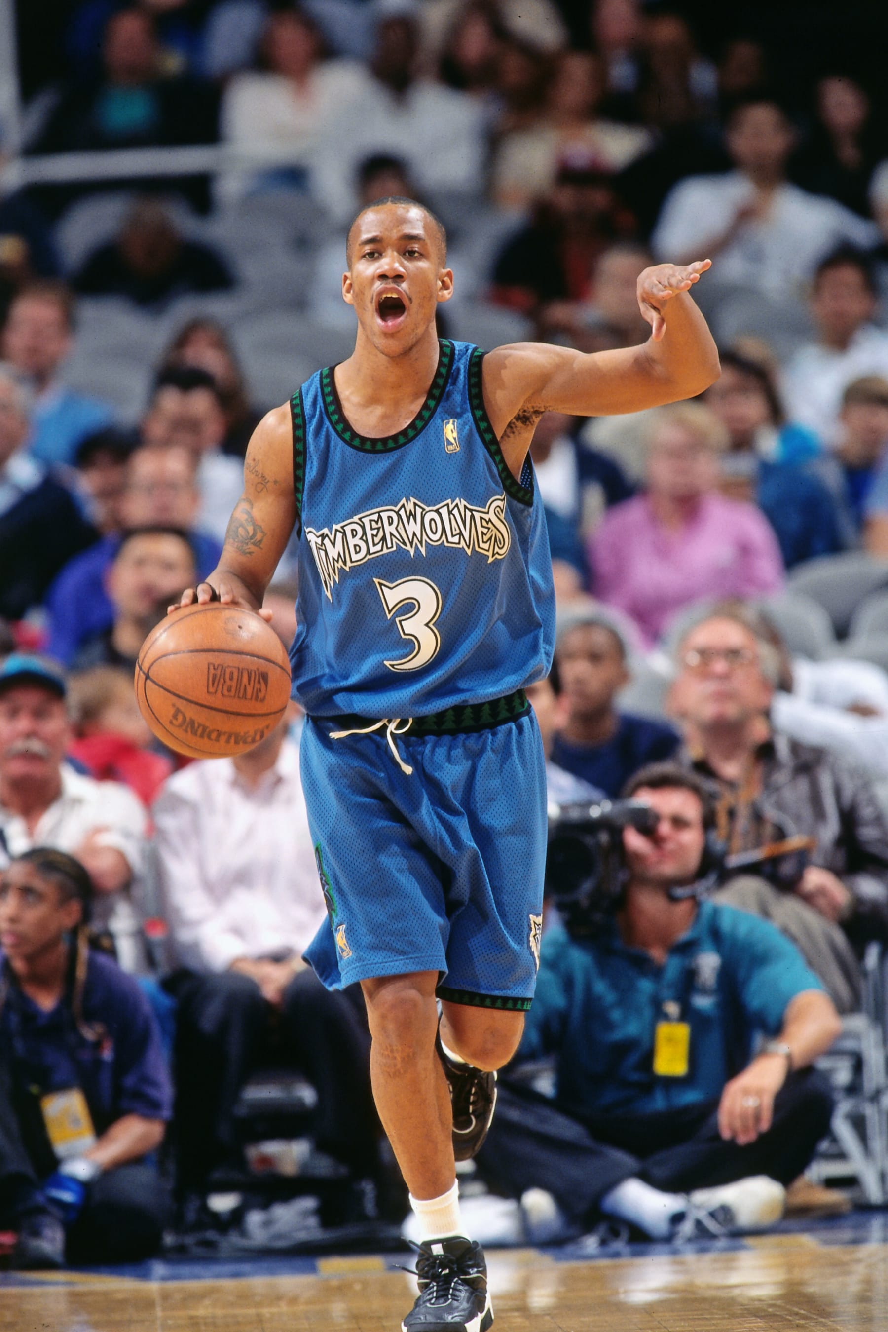 OAKLAND, CA - 1997: Stephon Marbury #3 of the Minnesota Timberwolves dribbles against the Golden State Warriors circa 1997 at the Arena in Oakland in Oakland, California. NOTE TO USER: User expressly acknowledges and agrees that, by downloading and or using this photograph, User is consenting to the terms and conditions of the Getty Images License Agreement. Mandatory Copyright Notice: Copyright 1997 NBAE (Photo by Rocky Widner/NBAE via Getty Images)