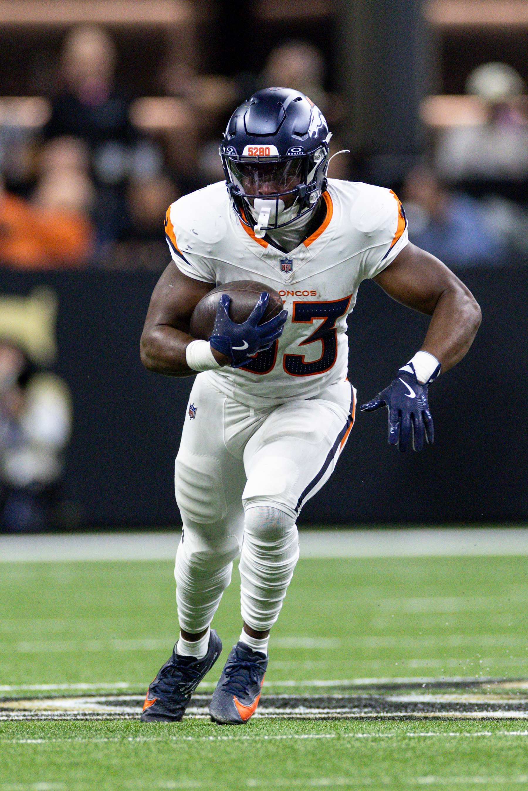 NEW ORLEANS, LOUSIANA - OCTOBER 17: Javonte Williams #33 of the Denver Broncos runs with the ball during an NFL Football game against the New Orleans Saints at Caesars Superdome on October 17, 2024 in New Orleans, Lousiana. (Photo by Michael Owens/Getty Images)