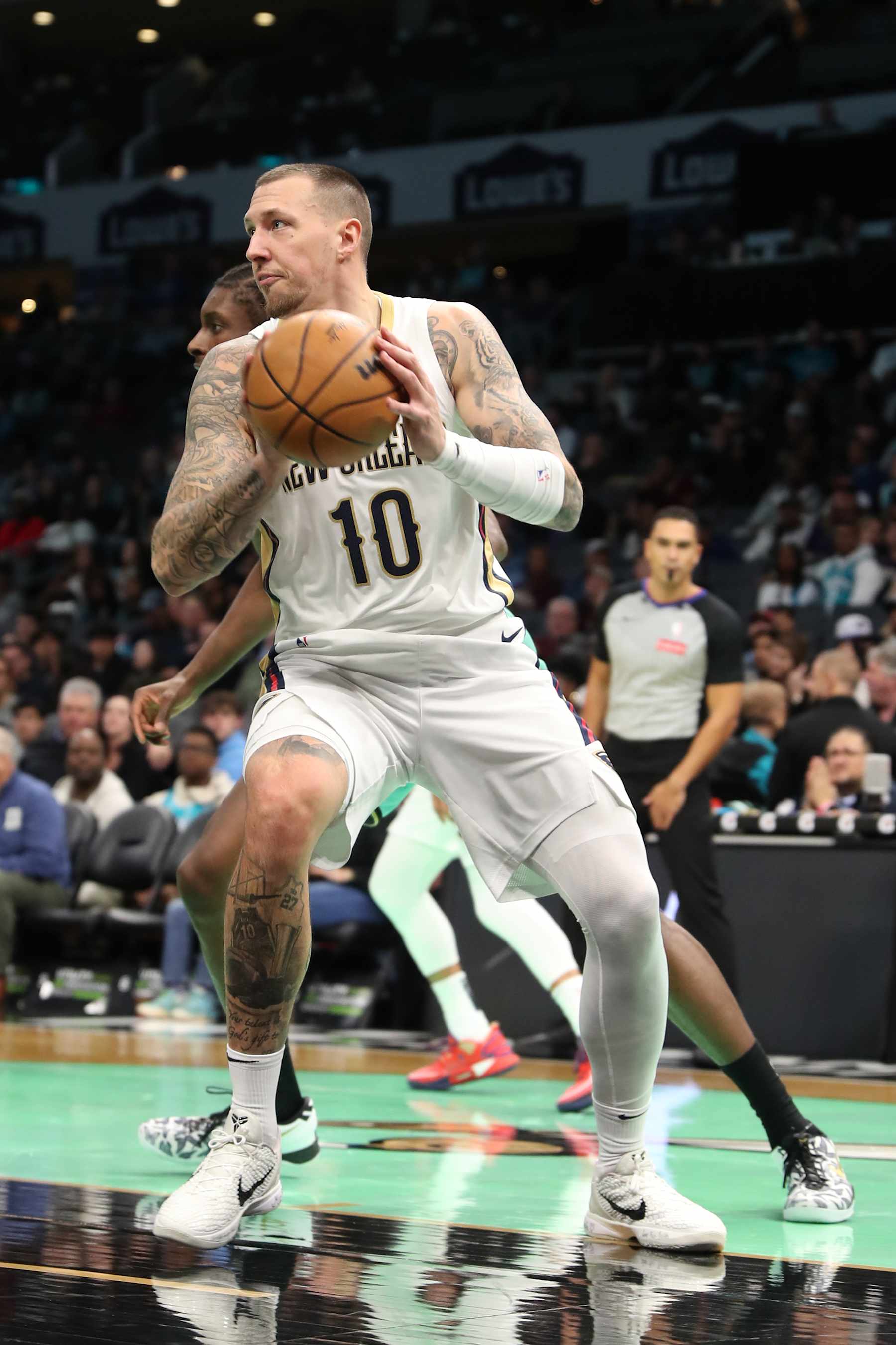 CHARLOTTE, NC - JANUARY 25: Daniel Theis #10 of the New Orleans Pelicans handles the ball during the game against the Charlotte Hornets  on January 25, 2025 at Spectrum Center in Charlotte, North Carolina. NOTE TO USER: User expressly acknowledges and agrees that, by downloading and or using this photograph, User is consenting to the terms and conditions of the Getty Images License Agreement. Mandatory Copyright Notice: Copyright 2025 NBAE (Photo by Brock Williams-Smith/NBAE via Getty Images)
