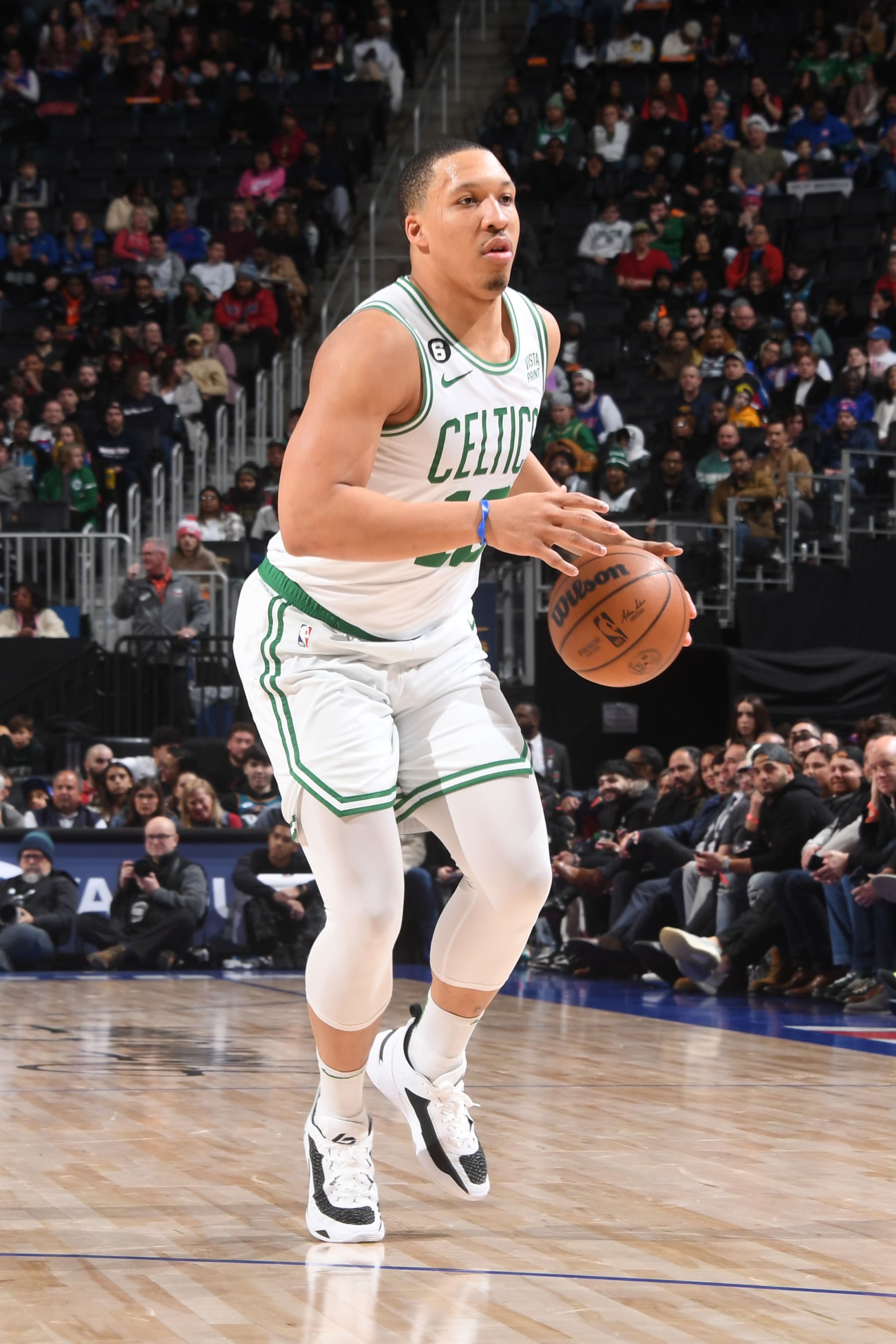 DETROIT, MI - FEBUARY 6:  Grant Williams #12 of the Boston Celtics handles the ball during the game  on Febuary 6, 2023 at Little Caesars Arena in Detroit, Michigan. NOTE TO USER: User expressly acknowledges and agrees that, by downloading and/or using this photograph, User is consenting to the terms and conditions of the Getty Images License Agreement. Mandatory Copyright Notice: Copyright 2023 NBAE (Photo by Chris Schwegler/NBAE via Getty Images)
