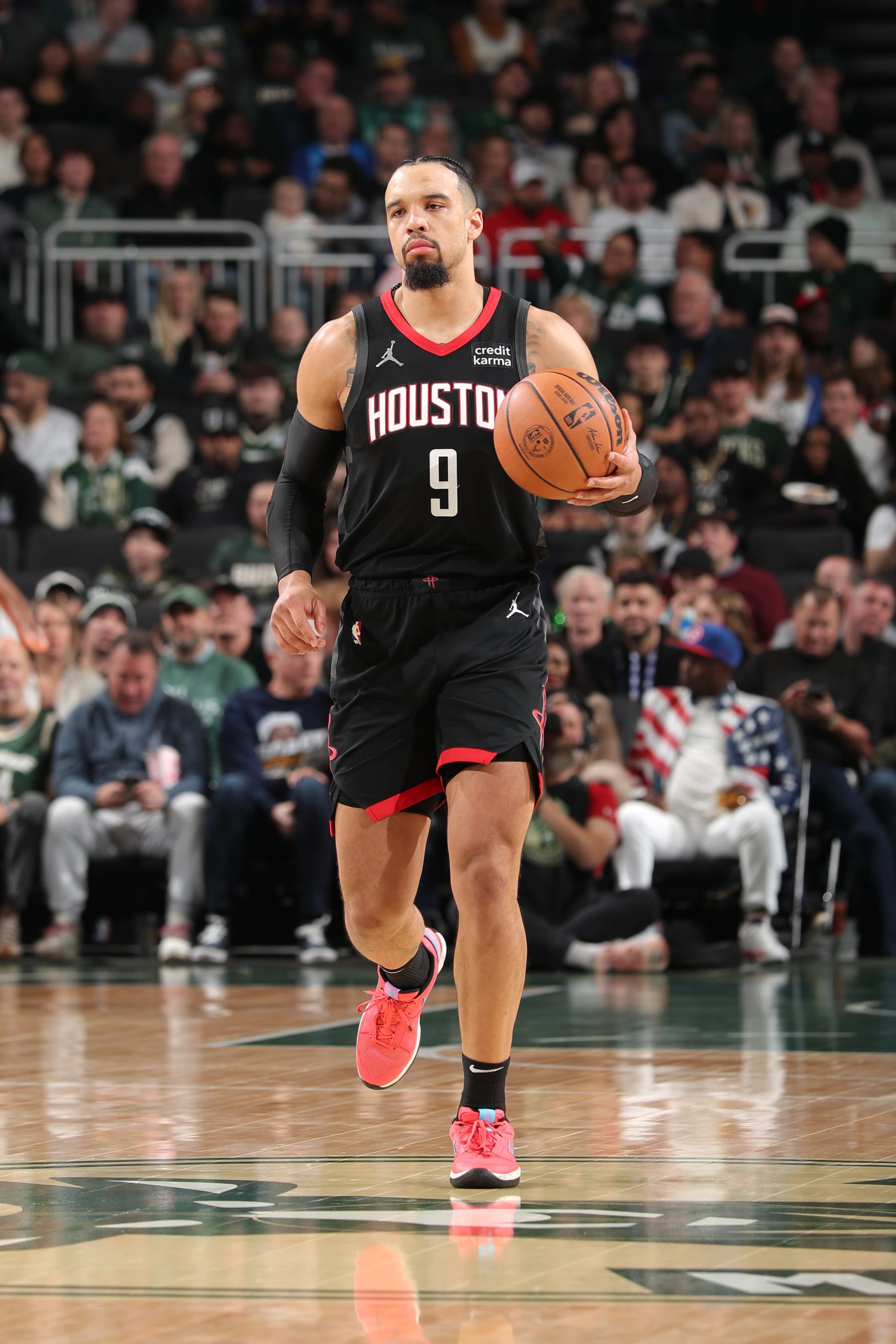 MILWAUKEE, WI - DECEMBER 17: Dillon Brooks #9 of the Houston Rockets dribbles the ball during the game against the Milwaukee Bucks on December 17, 2023 at the Fiserv Forum Center in Milwaukee, Wisconsin. NOTE TO USER: User expressly acknowledges and agrees that, by downloading and or using this Photograph, user is consenting to the terms and conditions of the Getty Images License Agreement. Mandatory Copyright Notice: Copyright 2023 NBAE (Photo by Gary Dineen/NBAE via Getty Images).