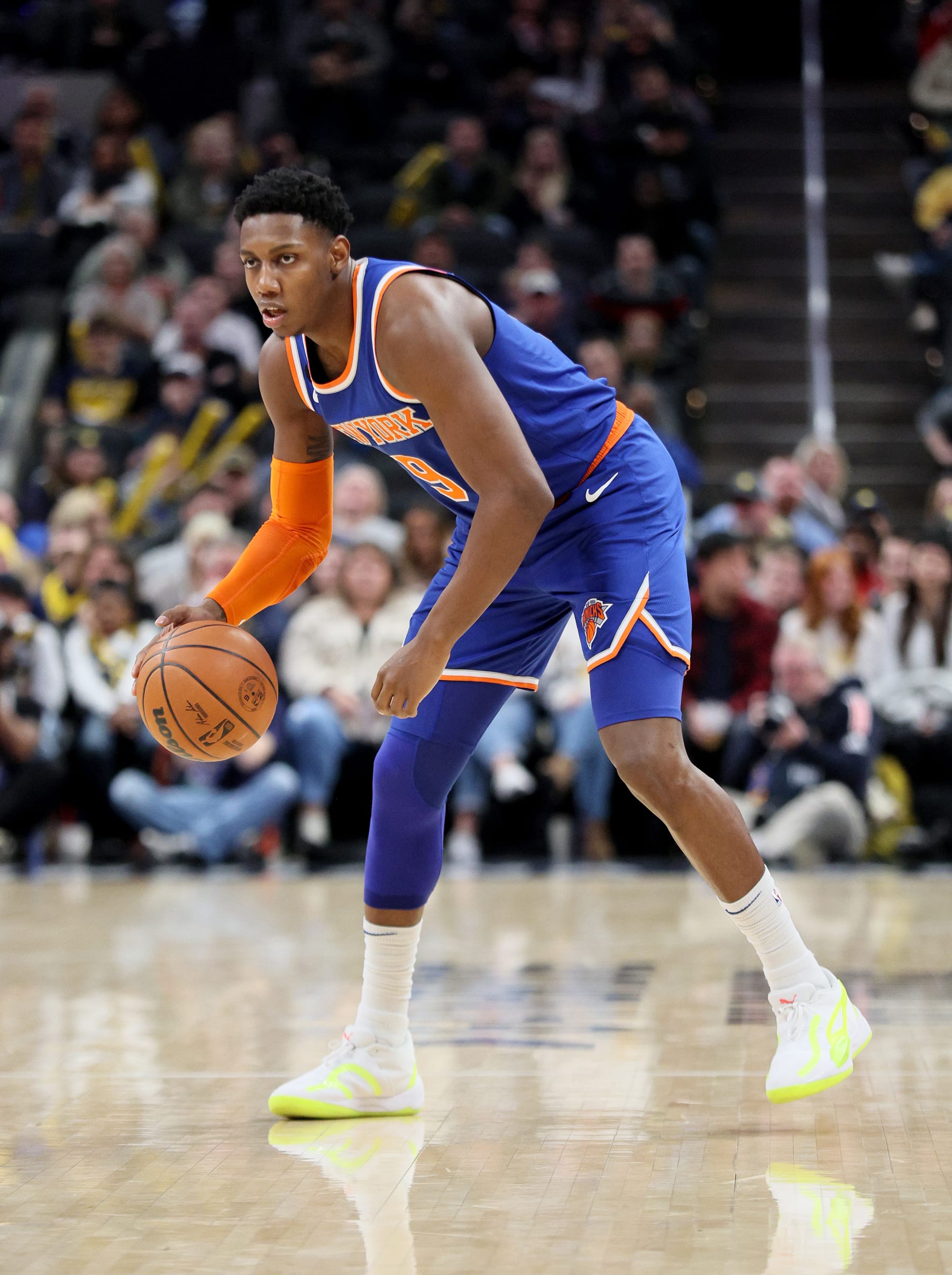 INDIANAPOLIS, INDIANA - DECEMBER 18:   RJ Barrett #9 of the New York Knicks dribbles the ball against the Indiana Pacers at Gainbridge Fieldhouse on December 18, 2022 in Indianapolis, Indiana.    NOTE TO USER: User expressly acknowledges and agrees that, by downloading and/or using this photograph, User is consenting to the terms and conditions of the Getty Images License Agreement. (Photo by Andy Lyons/Getty Images)