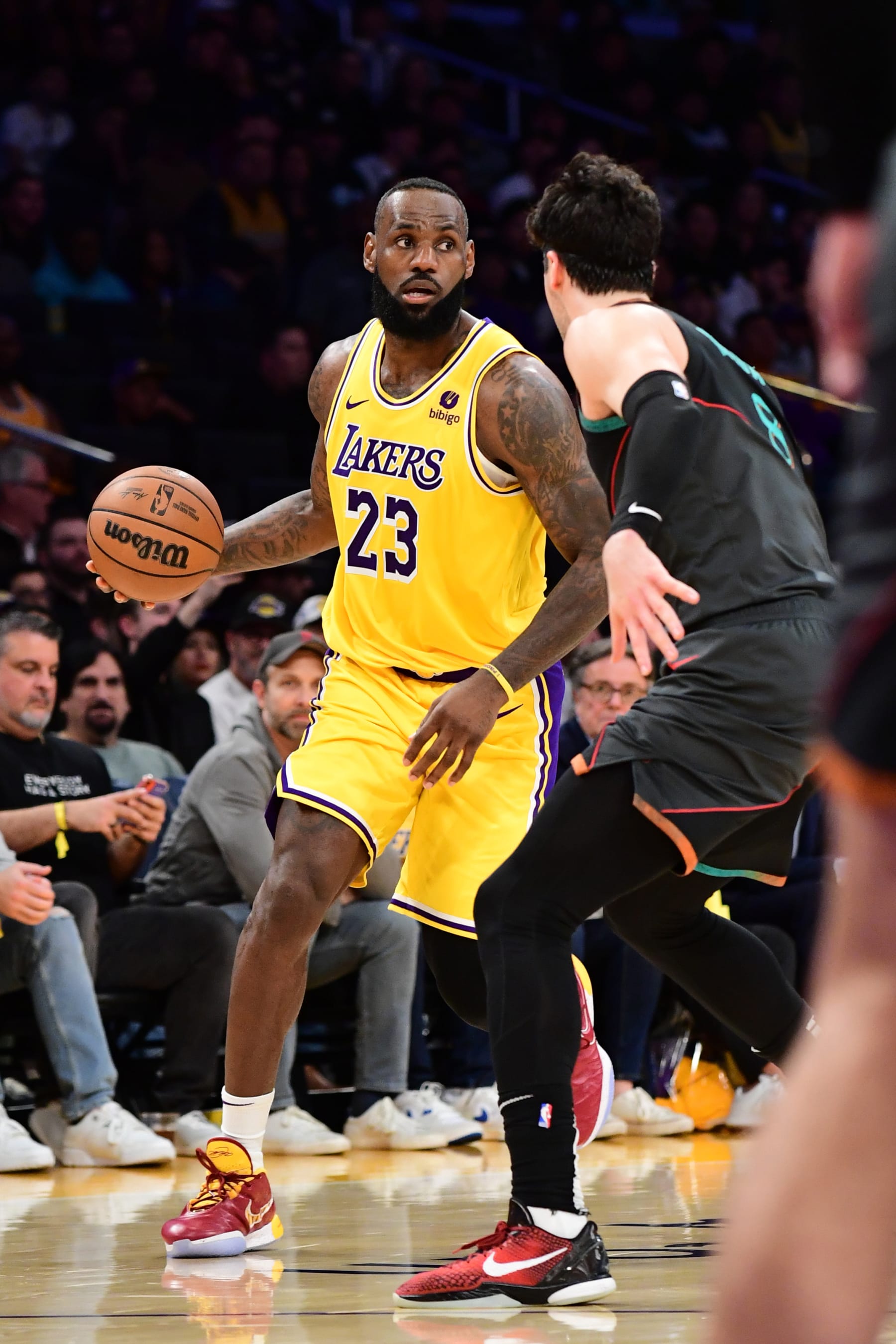 LOS ANGELES, CA - FEBRUARY 29: LeBron James #23 of the Los Angeles Lakers handles the ball during the game against the Washington Wizards on February 29, 2024 at Crypto.Com Arena in Los Angeles, California. NOTE TO USER: User expressly acknowledges and agrees that, by downloading and/or using this Photograph, user is consenting to the terms and conditions of the Getty Images License Agreement. Mandatory Copyright Notice: Copyright 2024 NBAE (Photo by Adam Pantozzi/NBAE via Getty Images)