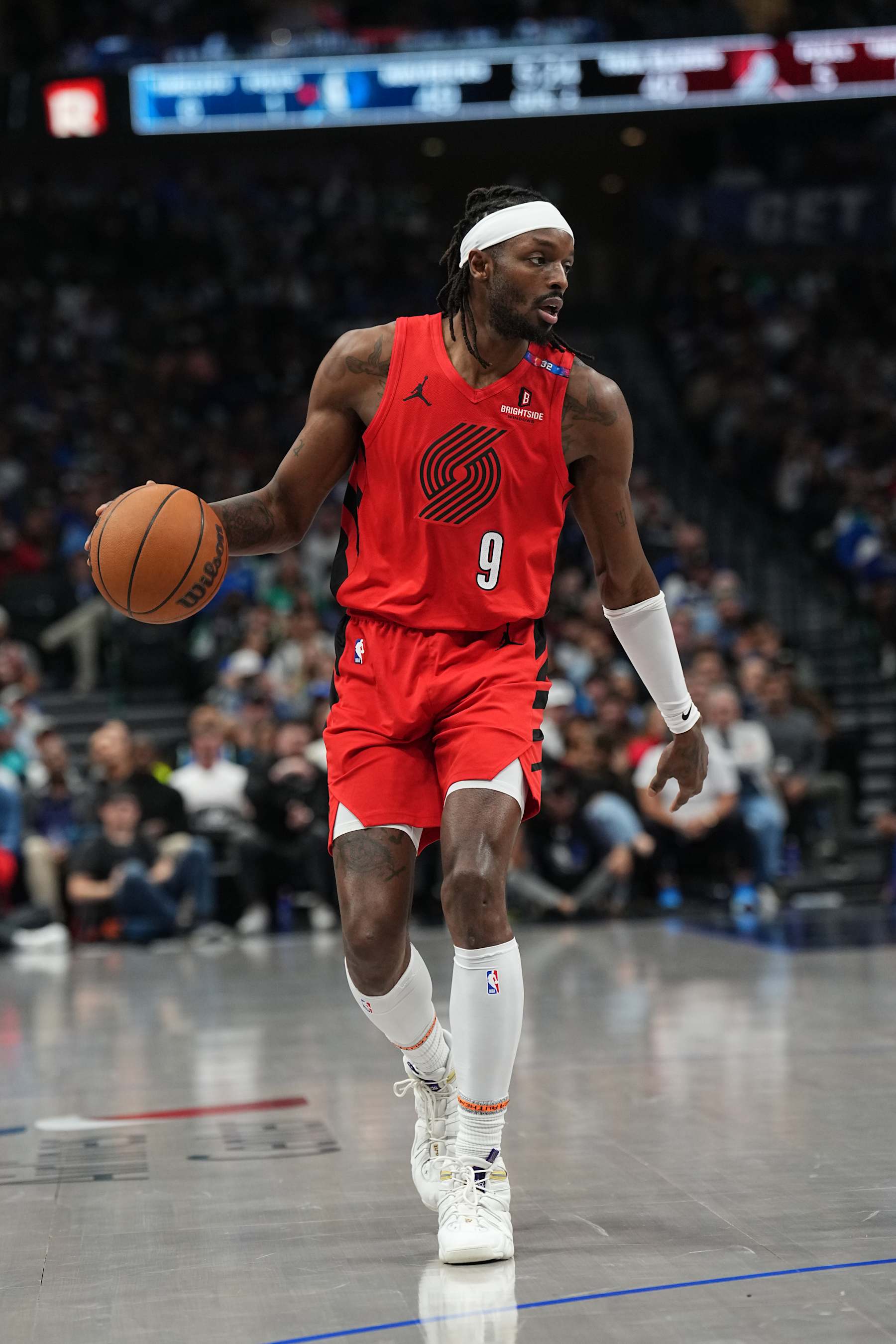 DALLAS, TX - DECEMBER 23: Jerami Grant #9 of the Portland Trail Blazers dribbles the ball during the game against the Dallas Mavericks on December 23, 2024 at American Airlines Center in Dallas, Texas. NOTE TO USER: User expressly acknowledges and agrees that, by downloading and or using this photograph, User is consenting to the terms and conditions of the Getty Images License Agreement. Mandatory Copyright Notice: Copyright 2024 NBAE (Photo by Glenn James/NBAE via Getty Images)
