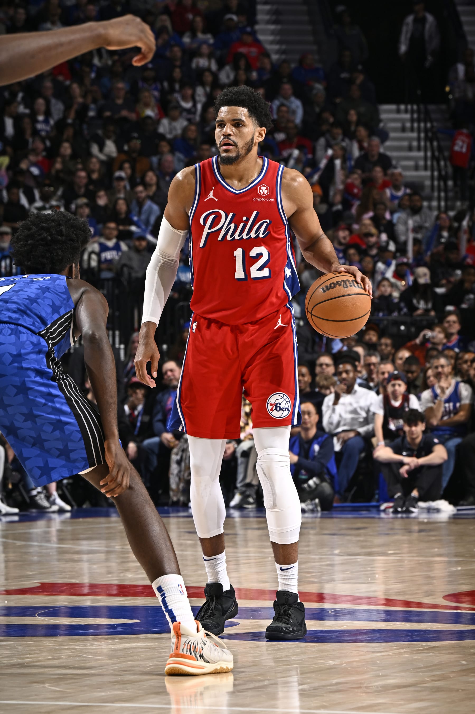 PHILADELPHIA, PA - APRIL 12: Tobias Harris #12 of the Philadelphia 76ers dribbles the ball during the game against the Orlando Magic on April 12, 2024 at the Wells Fargo Center in Philadelphia, Pennsylvania NOTE TO USER: User expressly acknowledges and agrees that, by downloading and/or using this Photograph, user is consenting to the terms and conditions of the Getty Images License Agreement. Mandatory Copyright Notice: Copyright 2024 NBAE (Photo by David Dow/NBAE via Getty Images)