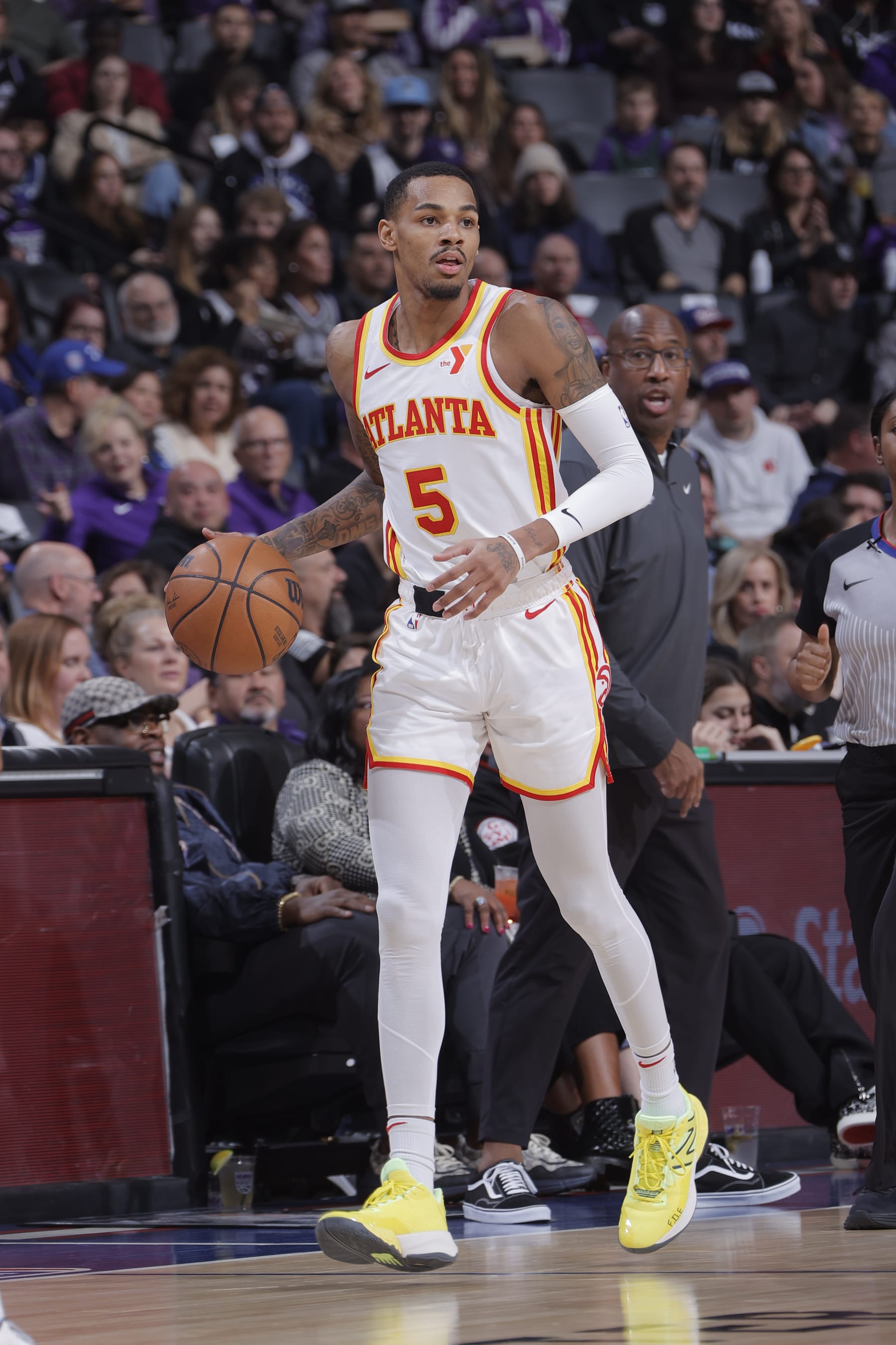 SACRAMENTO, CA - JANUARY 22: Dejounte Murray #5 of the Atlanta Hawks dribbles the ball during the game against the Sacramento Kings on January 22, 2024 at Golden 1 Center in Sacramento, California. NOTE TO USER: User expressly acknowledges and agrees that, by downloading and or using this Photograph, user is consenting to the terms and conditions of the Getty Images License Agreement. Mandatory Copyright Notice: Copyright 2024 NBAE (Photo by Rocky Widner/NBAE via Getty Images)