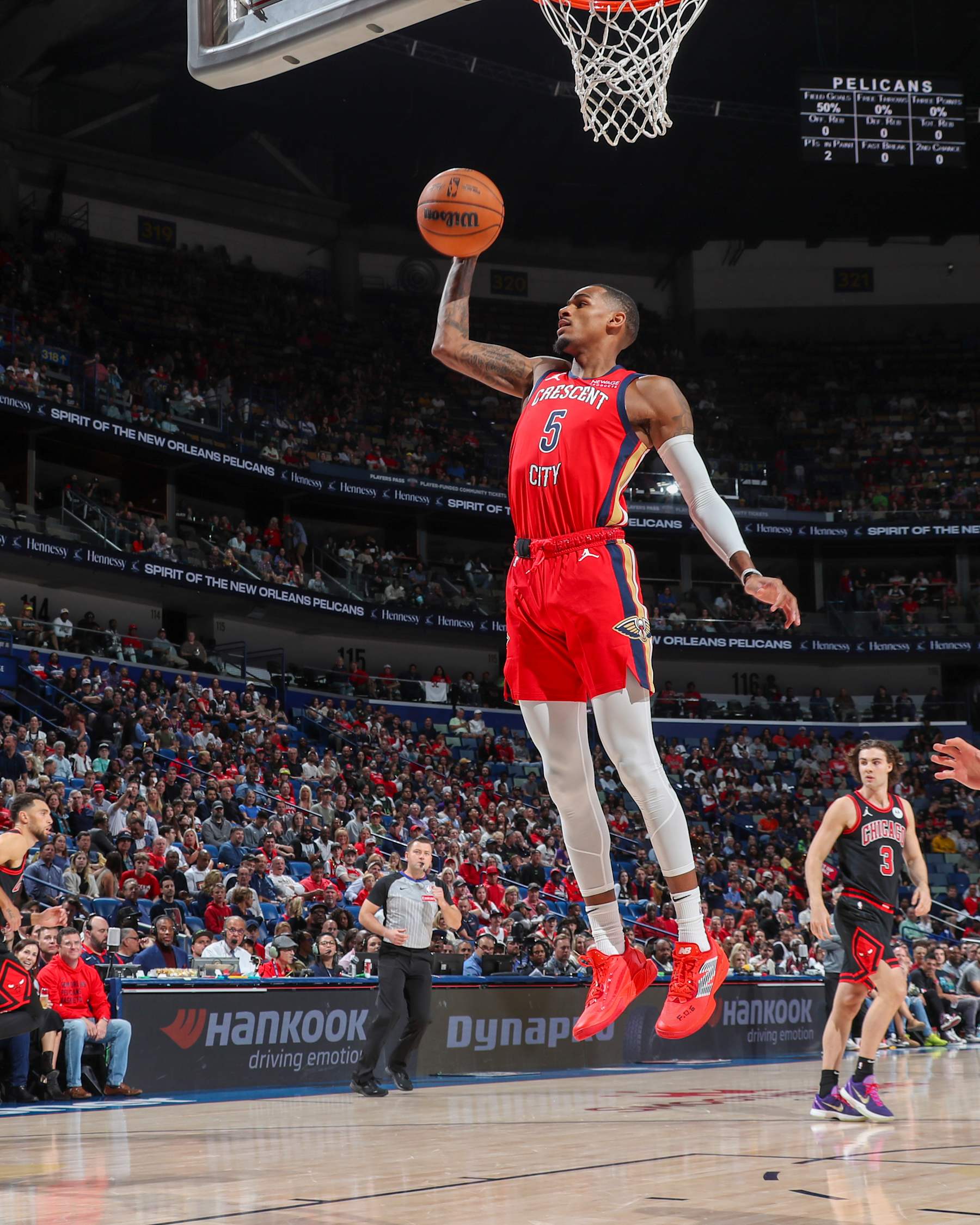NEW ORLEANS, LA - OCTOBER 23: Dejounte Murray #5 of the New Orleans Pelicans rebounds the ball during the game on October 23, 2024 at the Smoothie King Center in New Orleans, Louisiana. NOTE TO USER: User expressly acknowledges and agrees that, by downloading and or using this Photograph, user is consenting to the terms and conditions of the Getty Images License Agreement. Mandatory Copyright Notice: Copyright 2024 NBAE (Photo by Layne Murdoch Jr./NBAE via Getty Images)