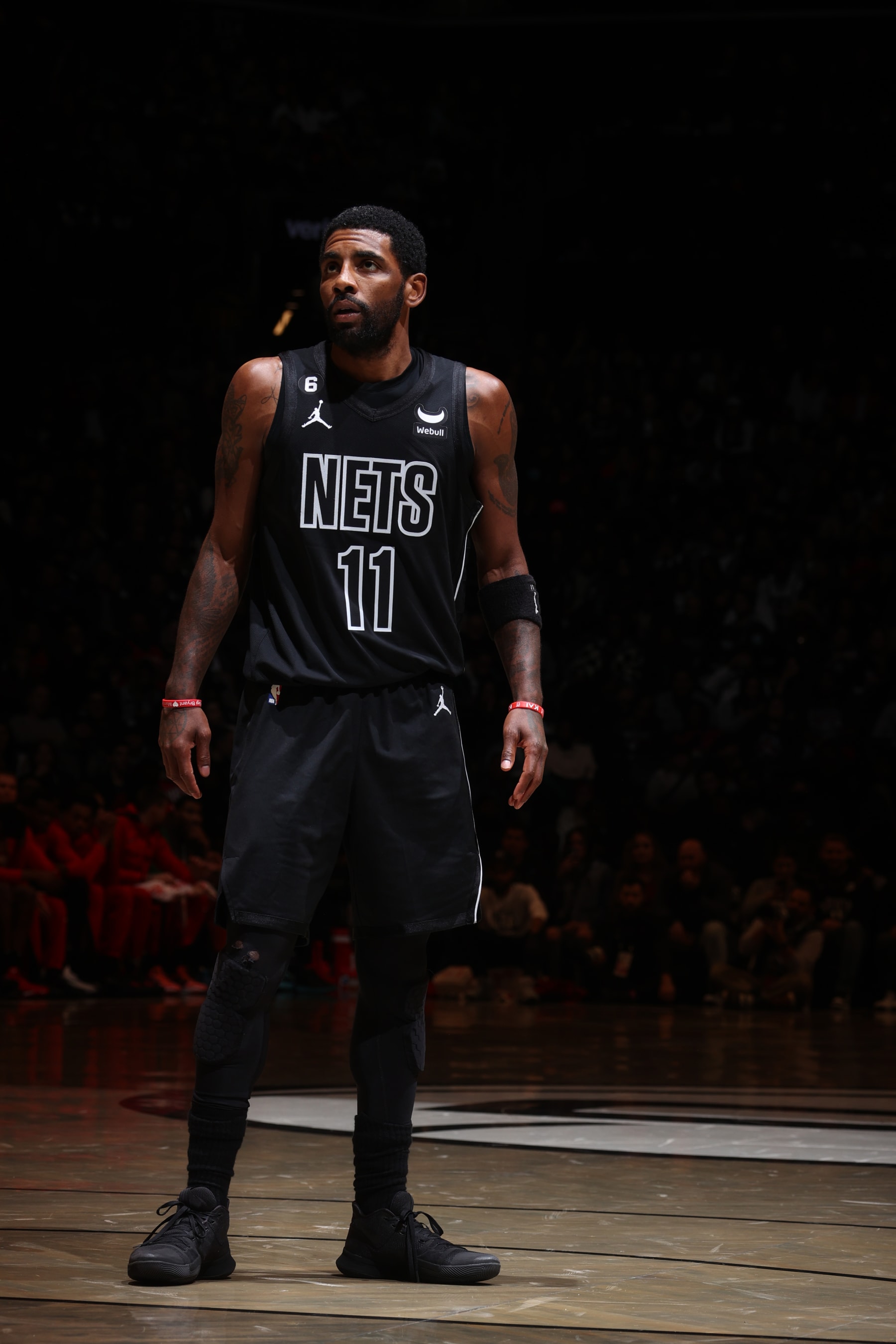 BROOKLYN, NY - DECEMBER 2: Kyrie Irving #11 of the Brooklyn Nets looks on during the game against the Toronto Raptors on December 2, 2022 at Barclays Center in Brooklyn, New York. NOTE TO USER: User expressly acknowledges and agrees that, by downloading and or using this Photograph, user is consenting to the terms and conditions of the Getty Images License Agreement. Mandatory Copyright Notice: Copyright 2022 NBAE (Photo by Nathaniel S. Butler/NBAE via Getty Images)