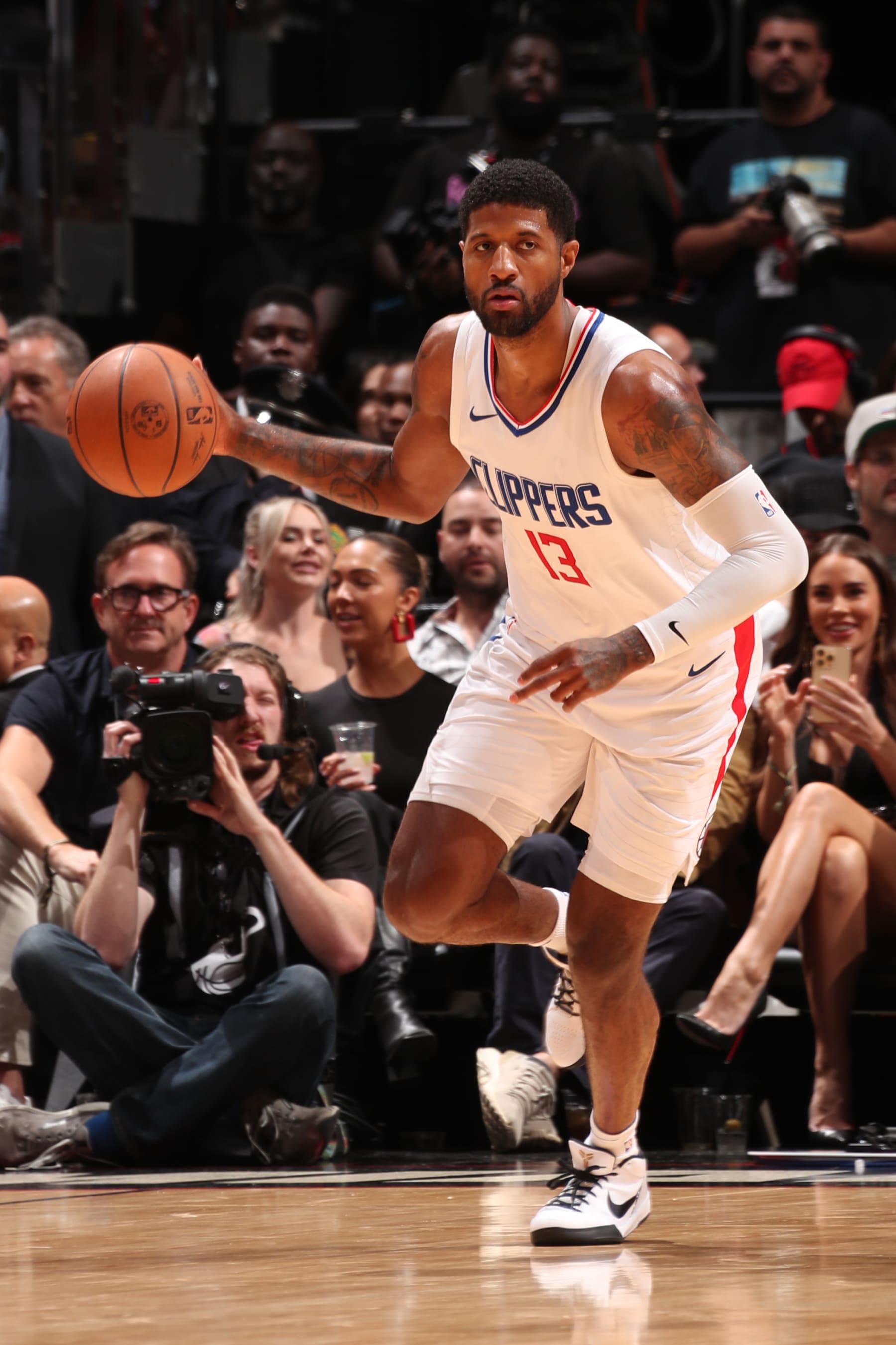 MIAMI, FL - FEBRUARY 4: Paul George #13 of the LA Clippers dribbles the ball during the game against the Miami Heat on February 4, 2024 at Kaseya Center in Miami, Florida. NOTE TO USER: User expressly acknowledges and agrees that, by downloading and or using this Photograph, user is consenting to the terms and conditions of the Getty Images License Agreement. Mandatory Copyright Notice: Copyright 2024 NBAE (Photo by Issac Baldizon/NBAE via Getty Images)