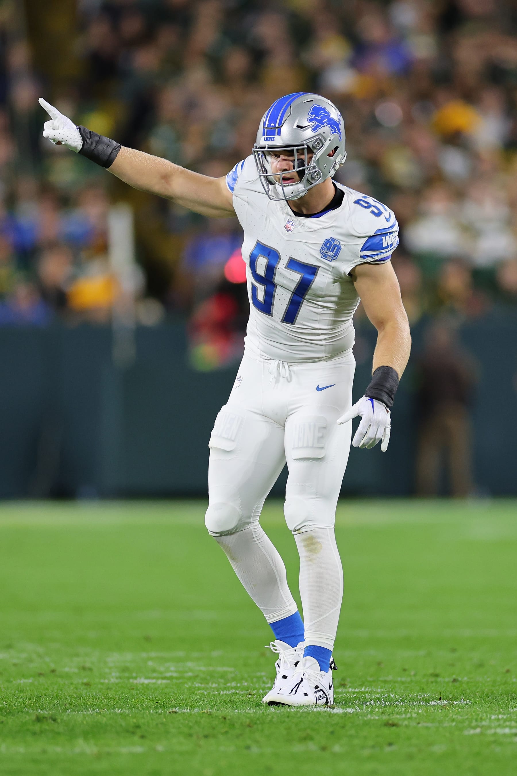 GREEN BAY, WISCONSIN - SEPTEMBER 28: Aidan Hutchinson #97 of the Detroit Lions anticipates a play during a game against the Green Bay Packers at Lambeau Field on September 28, 2023 in Green Bay, Wisconsin.  The Lions defeated the Packers 34-20. (Photo by Stacy Revere/Getty Images)