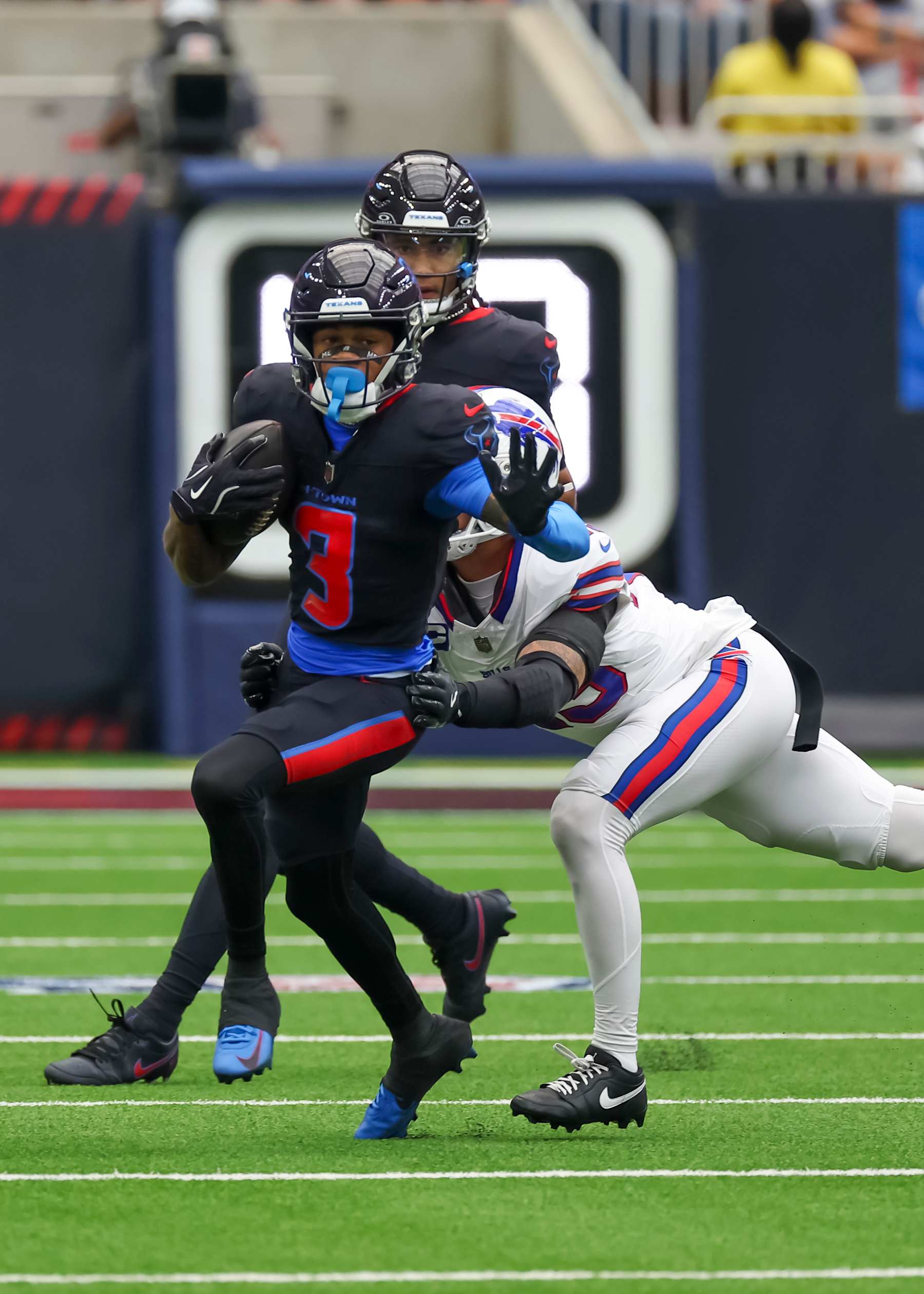HOUSTON, TX - OCTOBER 06:  Houston Texans wide receiver Tank Dell (3) carries the ball in the second quarter during the NFL game between the Buffalo Bills and Houston Texans on October 6, 2024 at NRG Stadium in Houston, Texas.  (Photo by Leslie Plaza Johnson/Icon Sportswire via Getty Images)